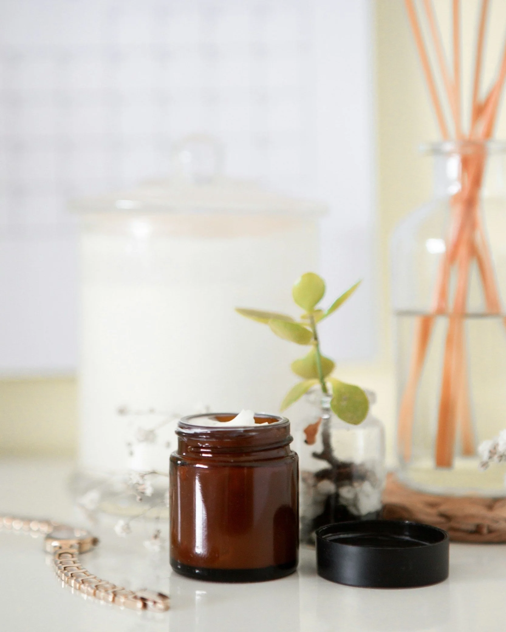 Bottle of facial cream and health supplies