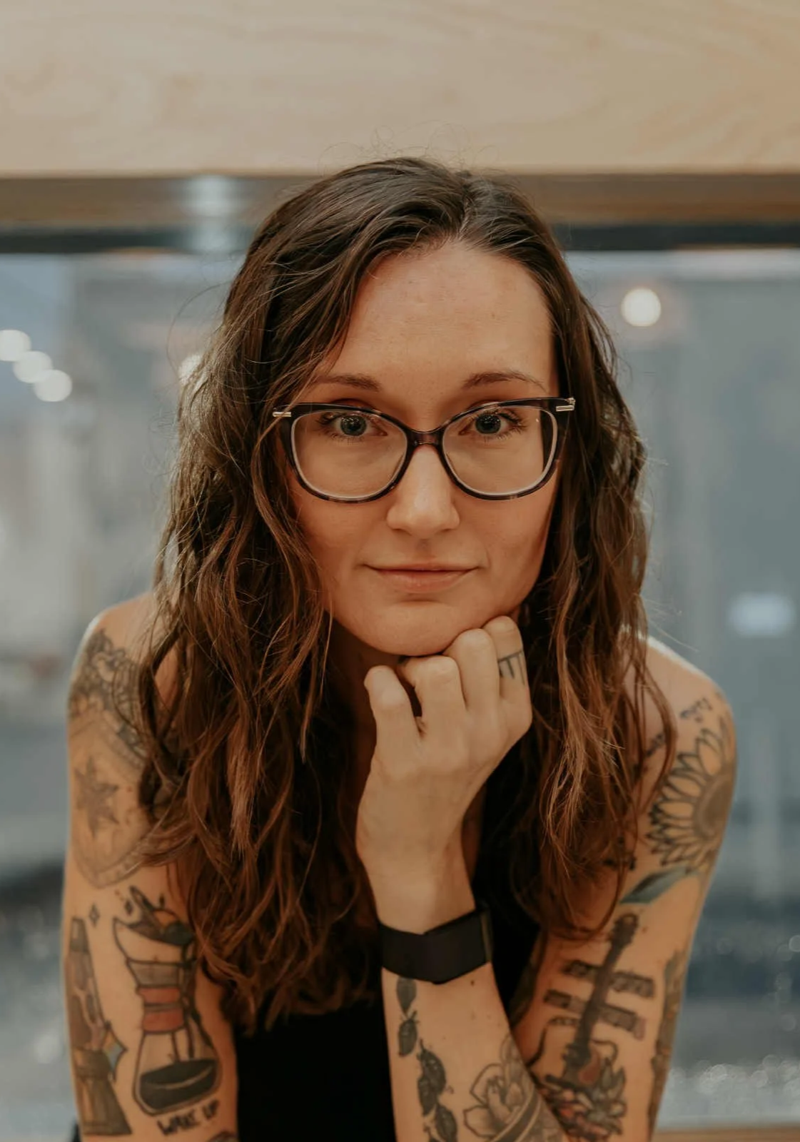 The image reflects an embodied, relational approach to wellness work rooted in presence, nervous system awareness, and authenticity. This photo supports themes of trauma-informed care, somatic healing, and person-centered practice.