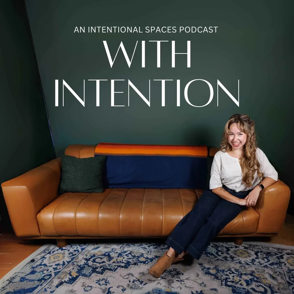 Intentional Spaces podcast cover about healing, storytelling, and intentional living, featuring a woman seated on a leather couch against a green background.