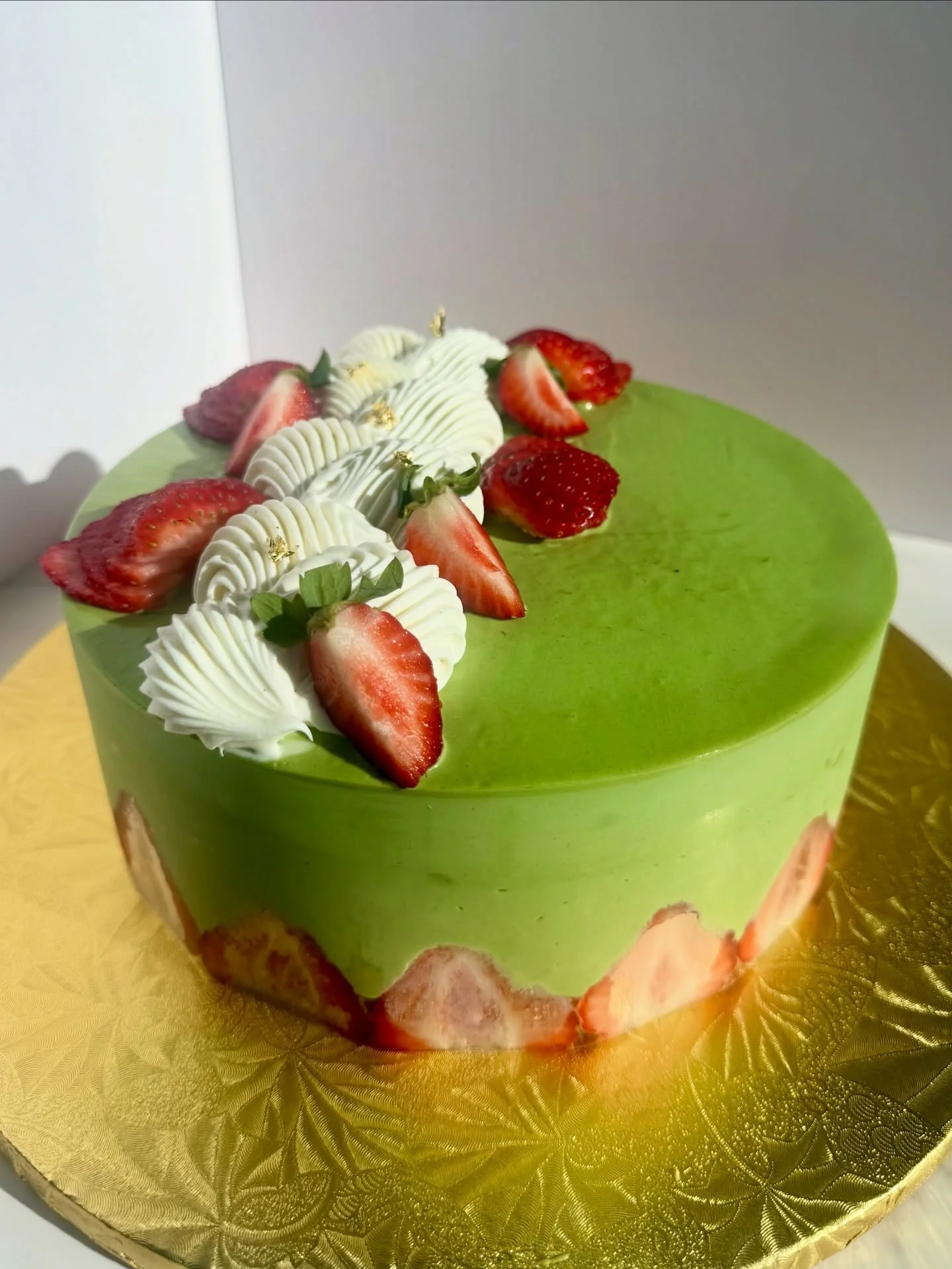 A Matcha Fraisier requested for a grandmother&rsquo;s celebration💚🍓

Matcha Whipped Ganache 
White Sponge Cake
Strawberry Confit
Vanilla Chantilly
Fresh Strawberries

Currently taking custom cake orders &mdash; DM for details ✨