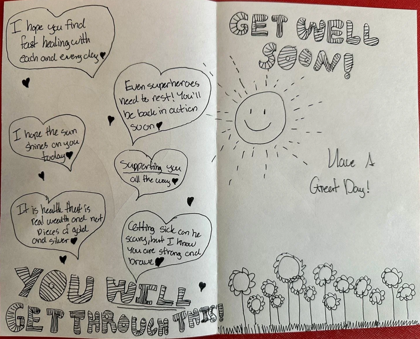 Handmade card with doodles and motivational messages. The right side features a smiling sun with the text, "Have A Great Day!" and a row of flowers at the bottom. The left side contains several speech bubbles with uplifting messages like, "I hope you