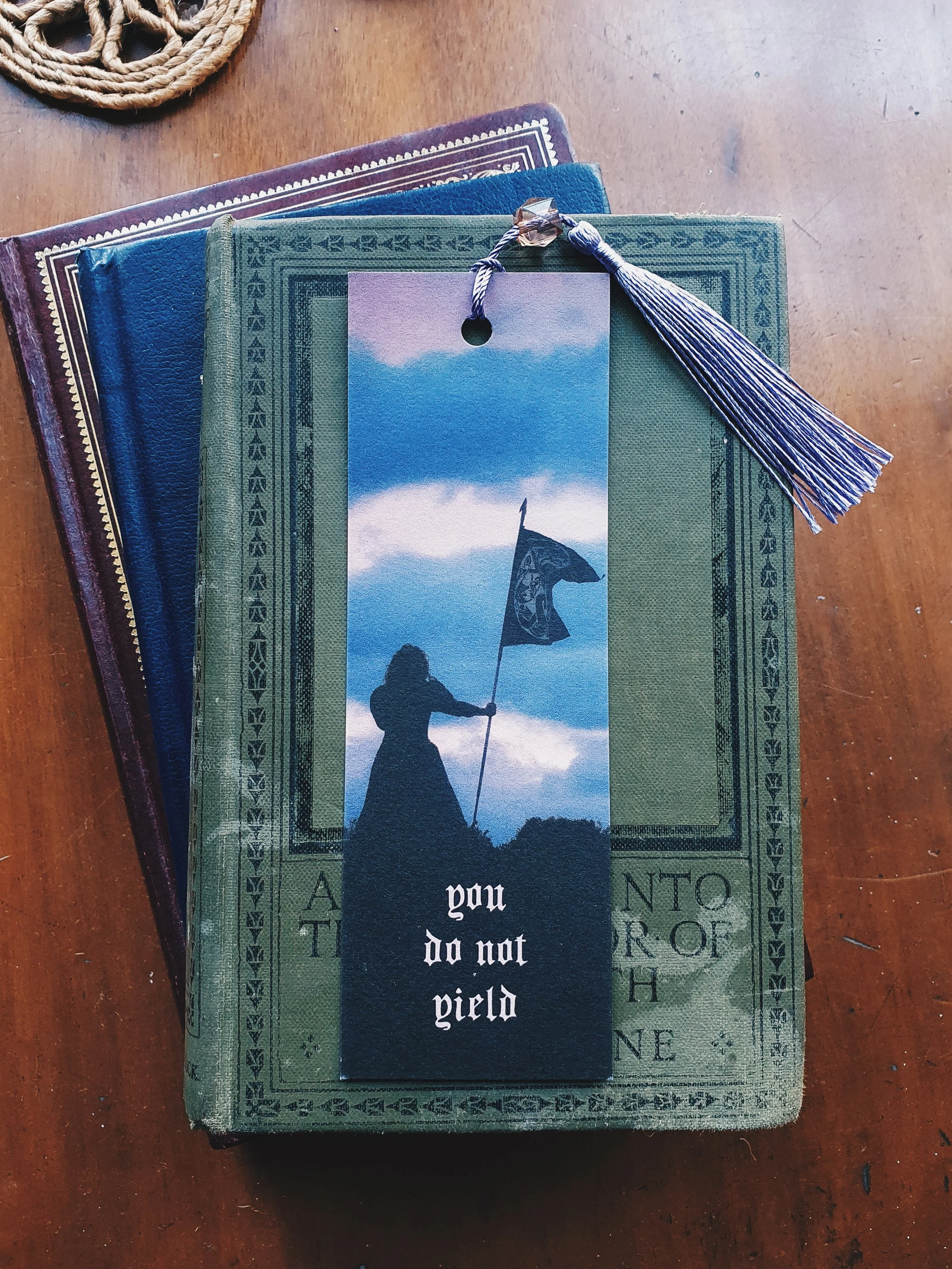 Dark Fantasy style figure on the scottish moorland hillside, a female warrior ready to protect her kingdom by all means necessary