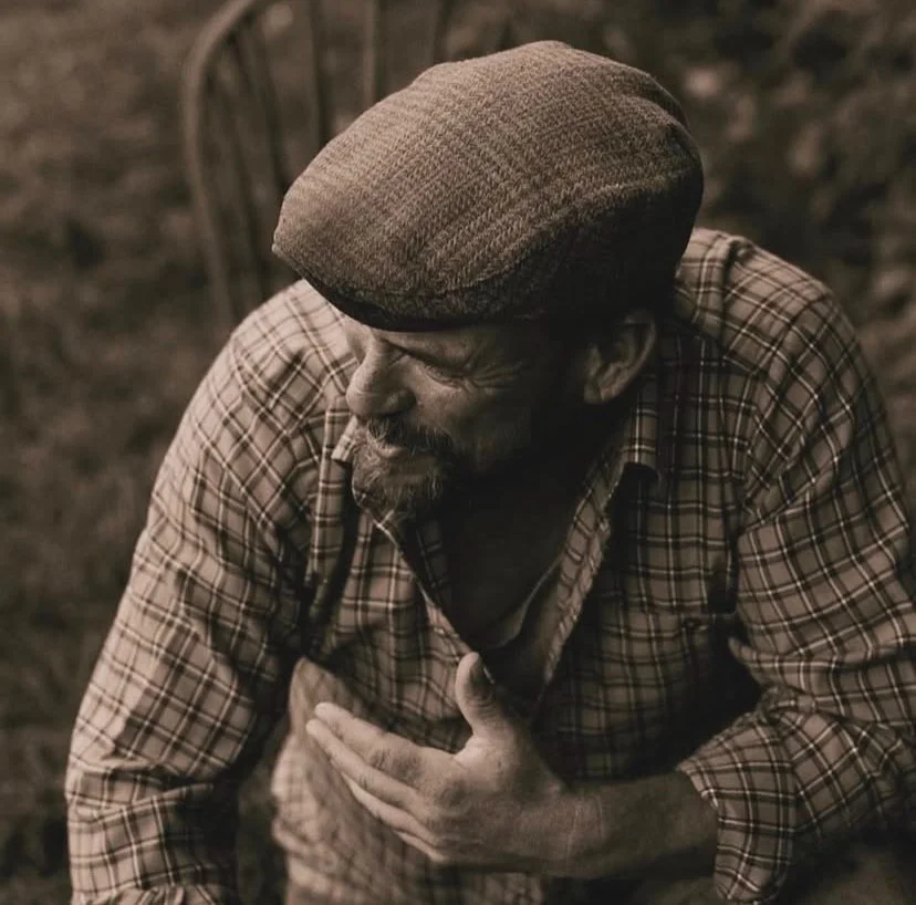 Black & White photo of Paul with cap