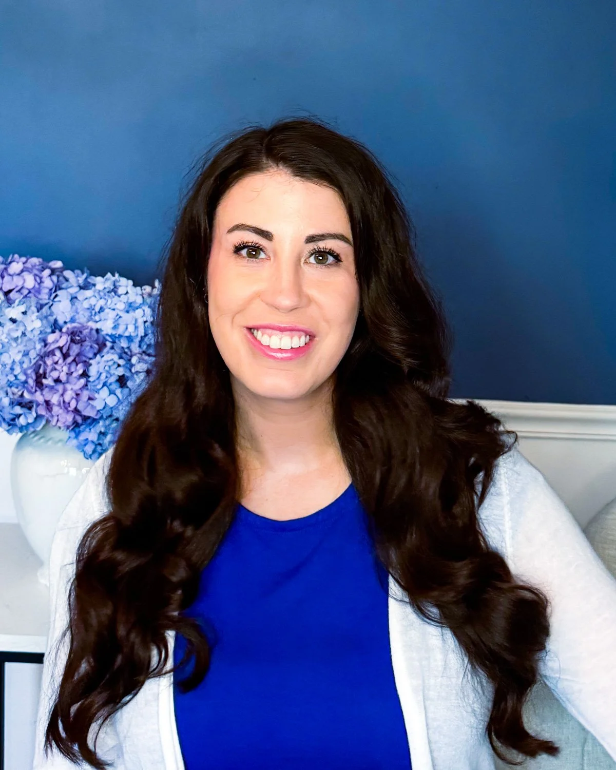 Erin Pennington, Licensed Professional Counselor, smiling who helps women with timeline anxiety telehealth in virginia