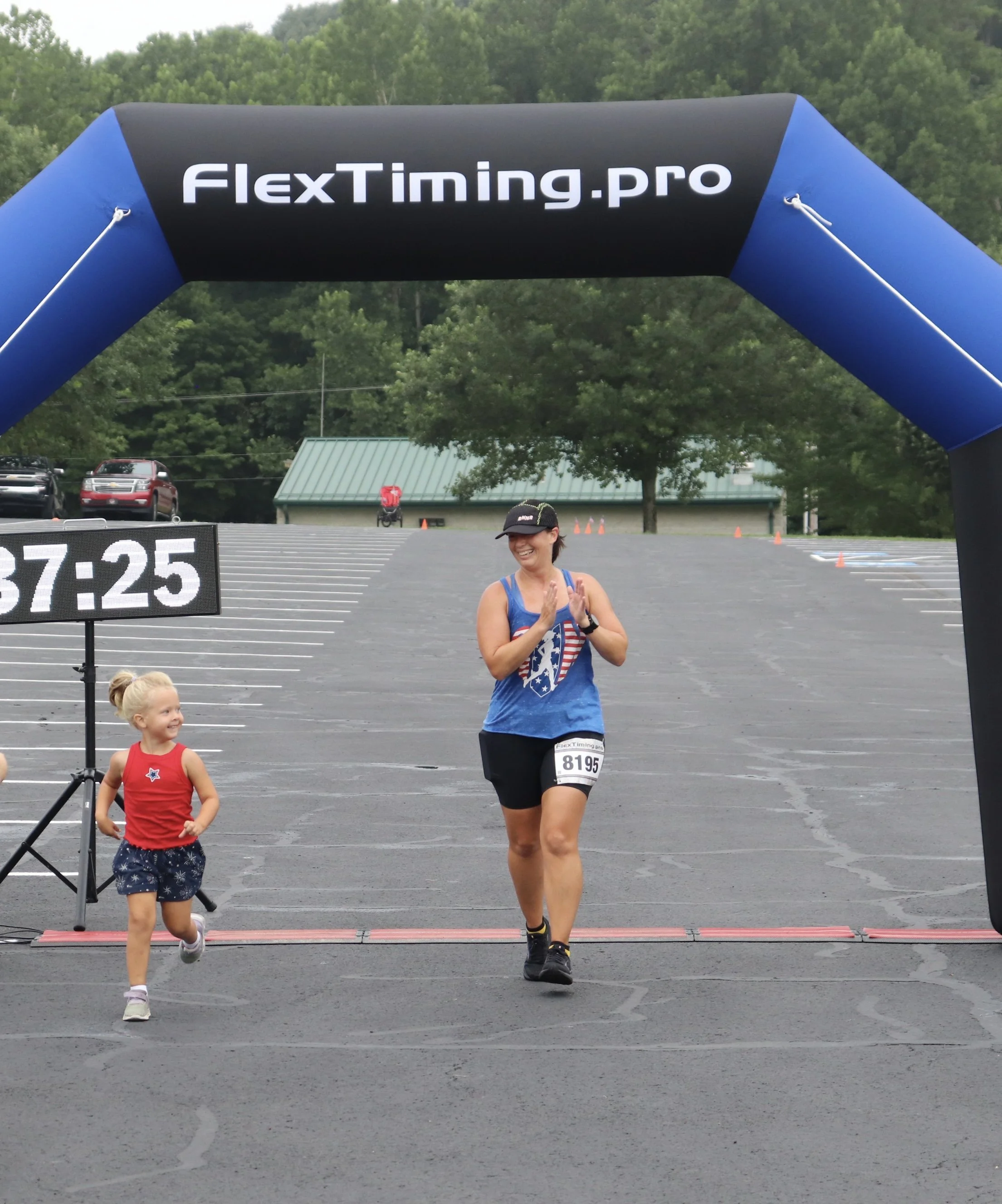 finish line Heather and niece 5k.jpeg