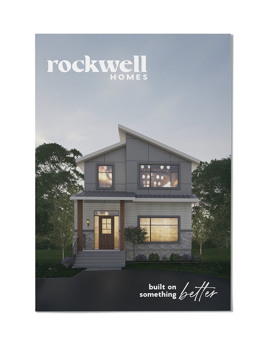 Brochure of a modern two-story house with a sloped roof, large windows, front porch, and landscaped yard, with the text "rockwell HOMES" at the top and "built on something better" at the bottom.