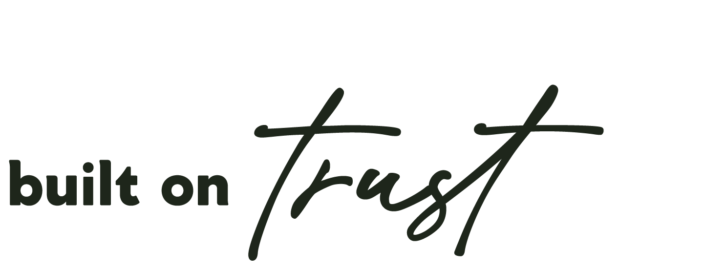 Text graphic that says "built on trust" in black script and bold font.