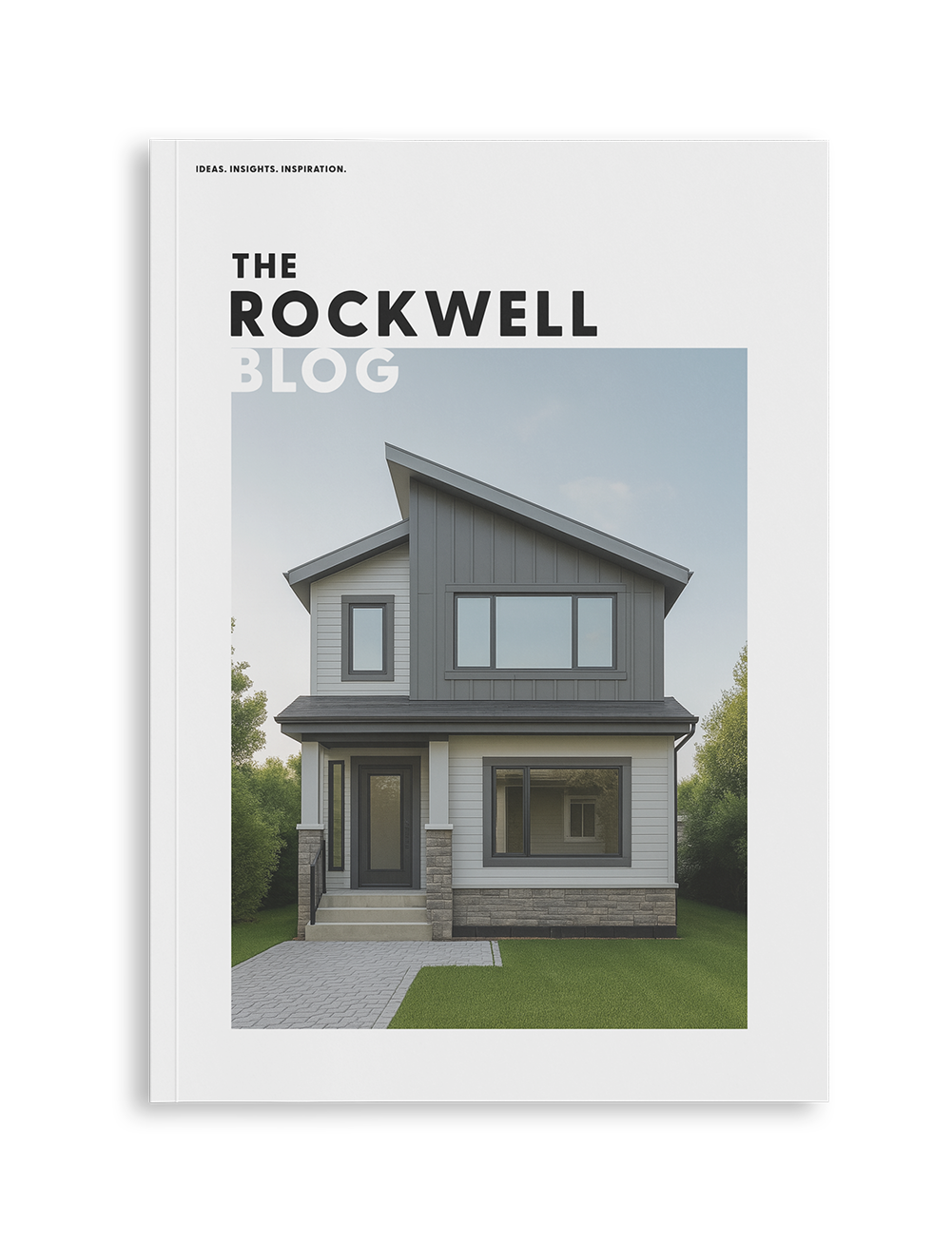 Cover of a blog titled "The Rockwell Blog" featuring a modern two-story house with gray siding, stone accents, and large windows, set against a clear sky with green foliage in the background.