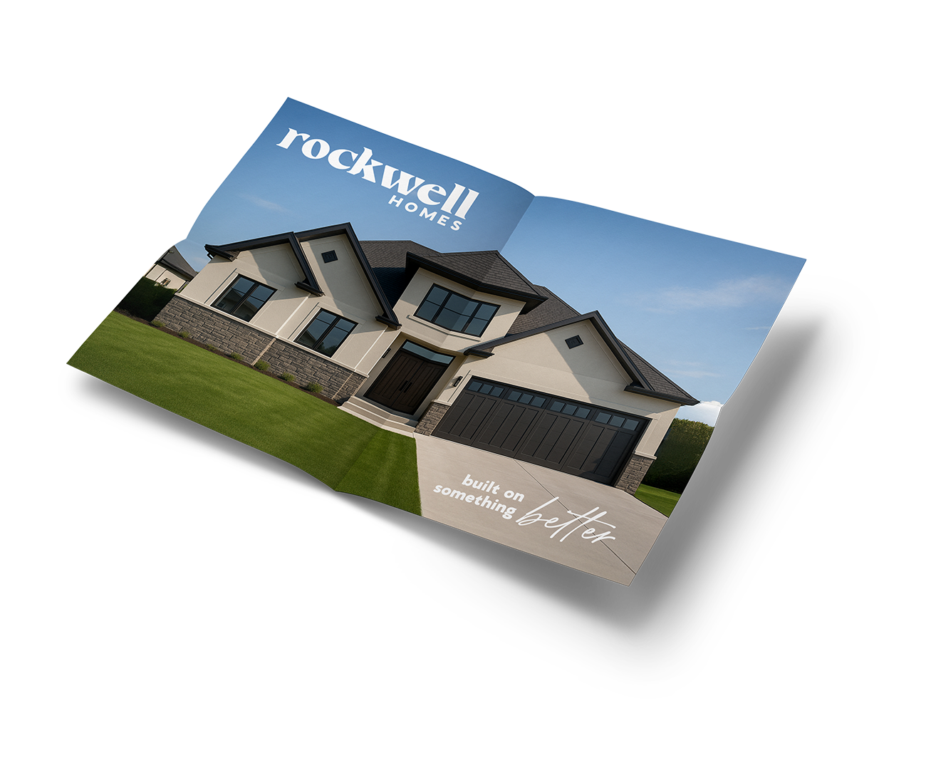 Brochure for Rockwell Homes featuring a modern two-story house with a dark garage door, black window frames, and a well-maintained front lawn. The brochure's heading reads 'rockwell HOMES' and the tagline says 'built on something better.'