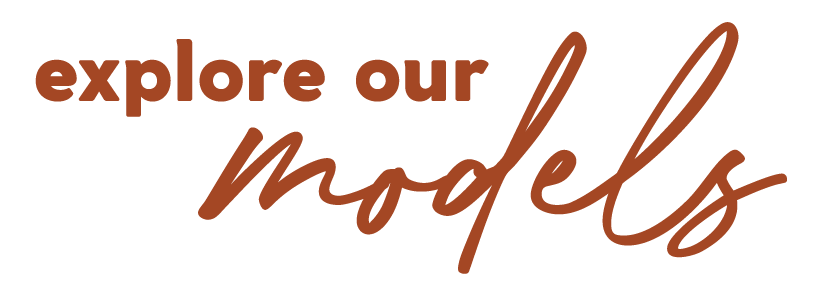 Text that says 'explore our models' in brown font, with 'explore our' in bold and 'models' in cursive.