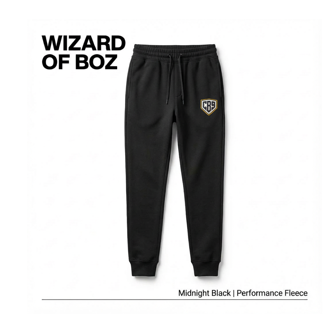 Black joggers with a small logo on the front left pocket and the text "WIZARD OF BOZ" in the top left corner.