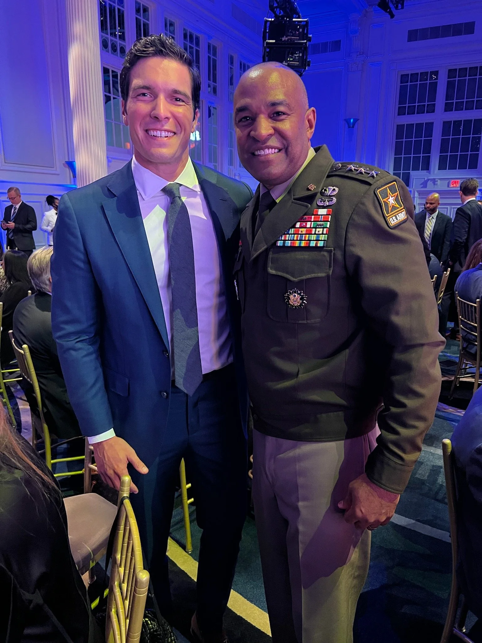 General Vereen congratulates news correspondent Will Reeve on Reeve's induction into the Boys and Girls Clubs of America Alumni Hall of Fame in 2024.