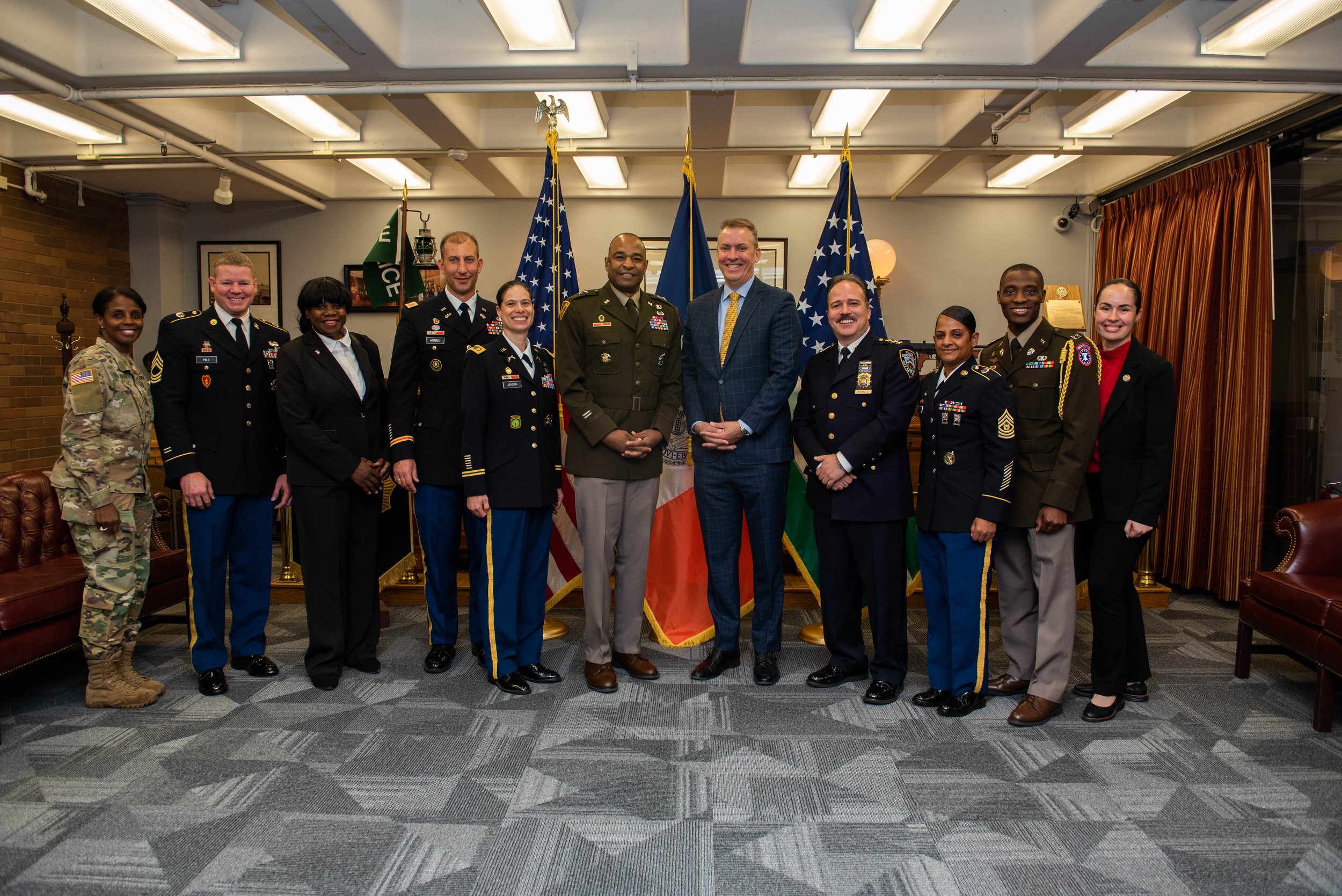 Lt. Gen. Vereen and military members join local officials to discuss community support.