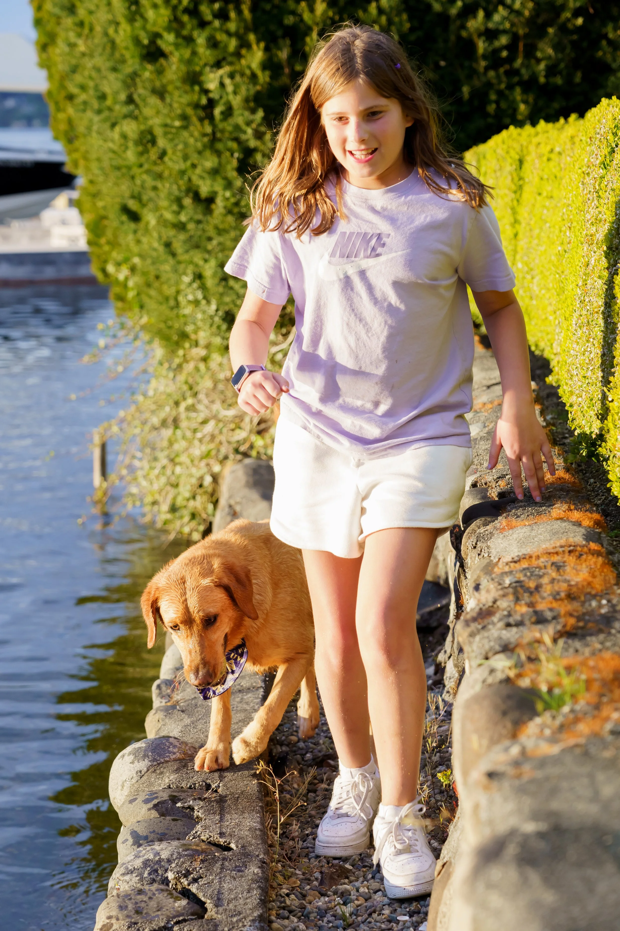 girl-walking-dog-waterfront-photo-seattle.jpg