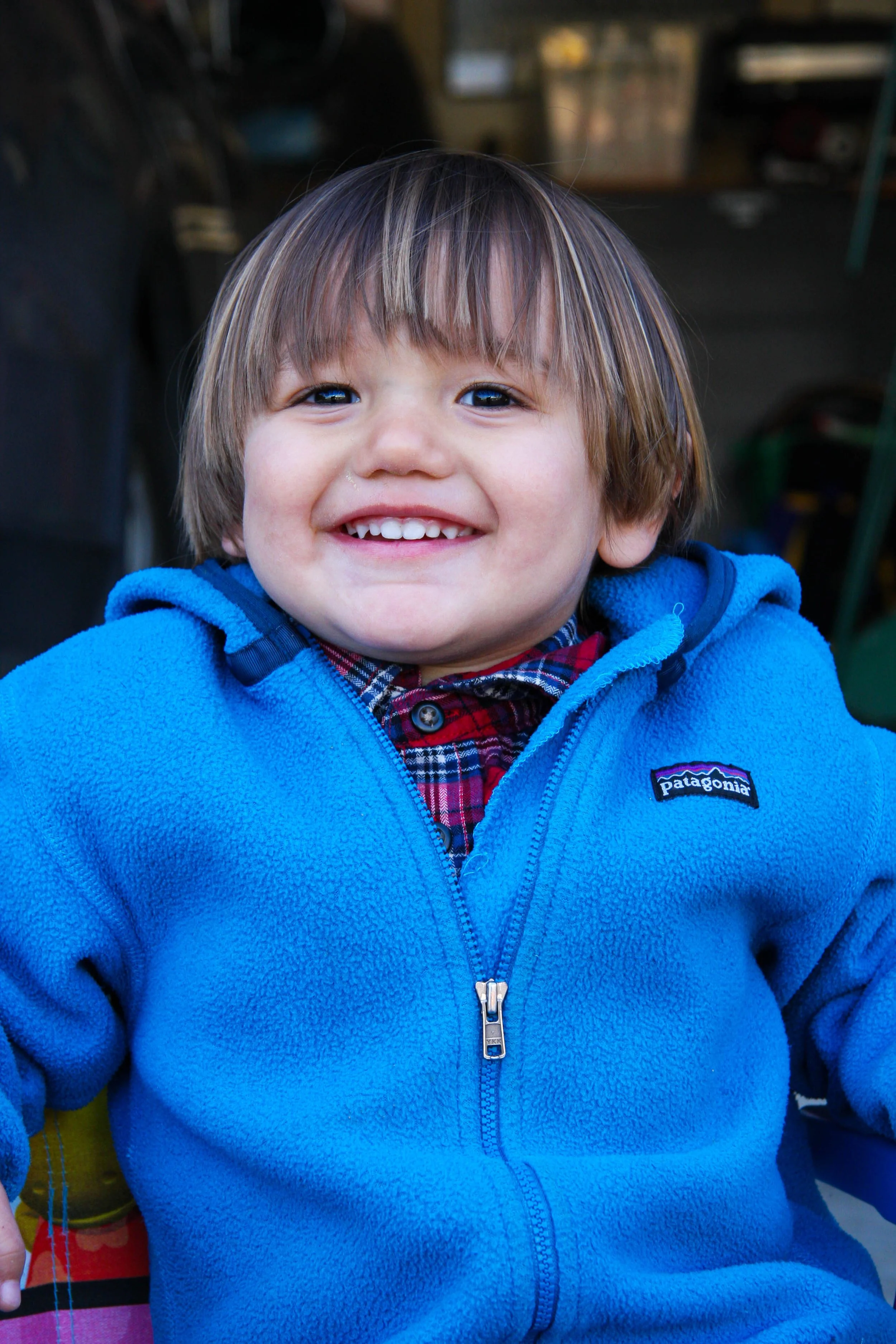 outdoor-smiling-boy-blue-fleece.jpg