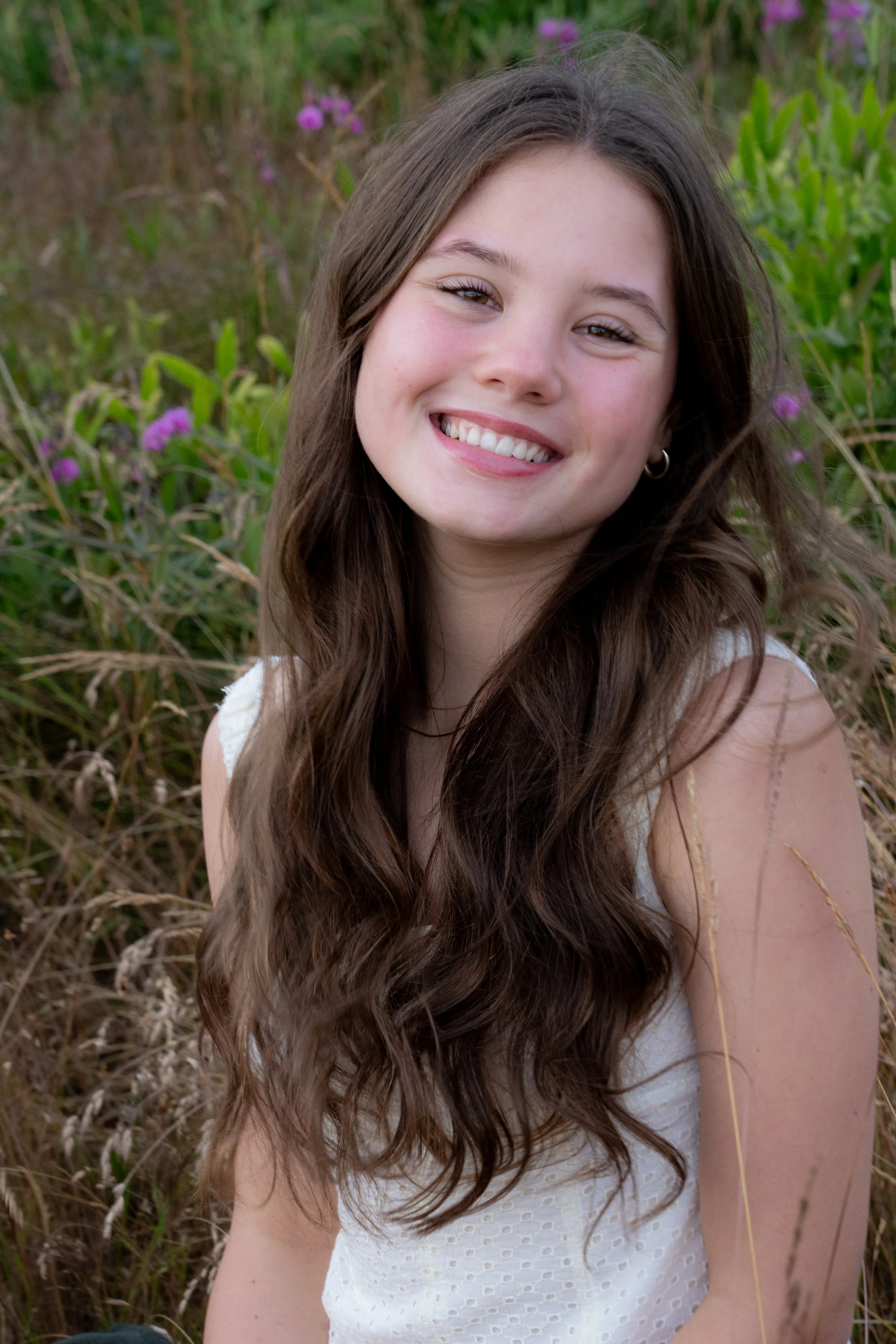senior-portrait-smiling-girl-wildflowers.jpg.jpg