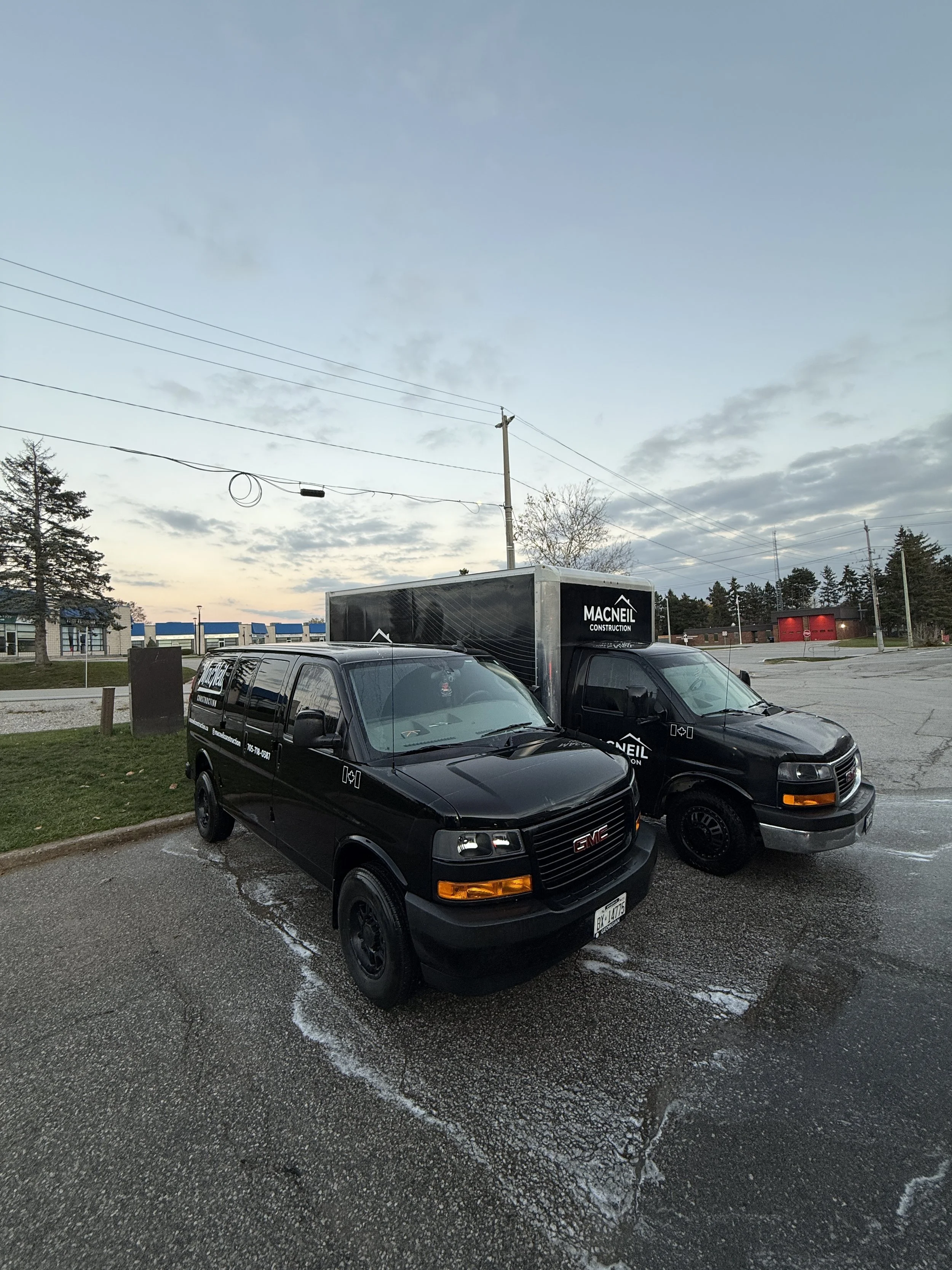 Two Black Macneil Construction Vans, Exterior Wash, Weekly Fleet Washing