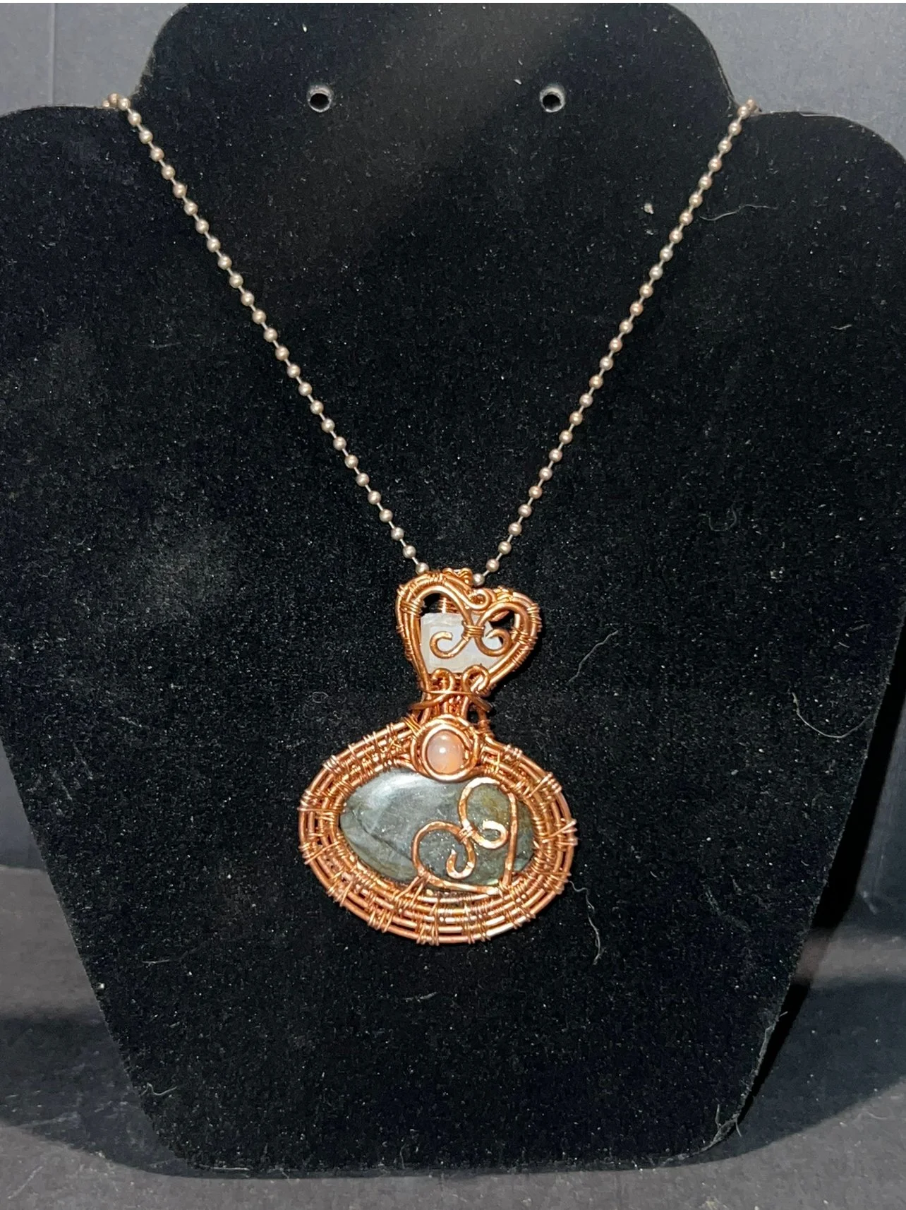 Mystic labradorite & ethiopian heart pendent -copper wire wrapped necklace. Adorned with a pretty little rose quartz in the center.