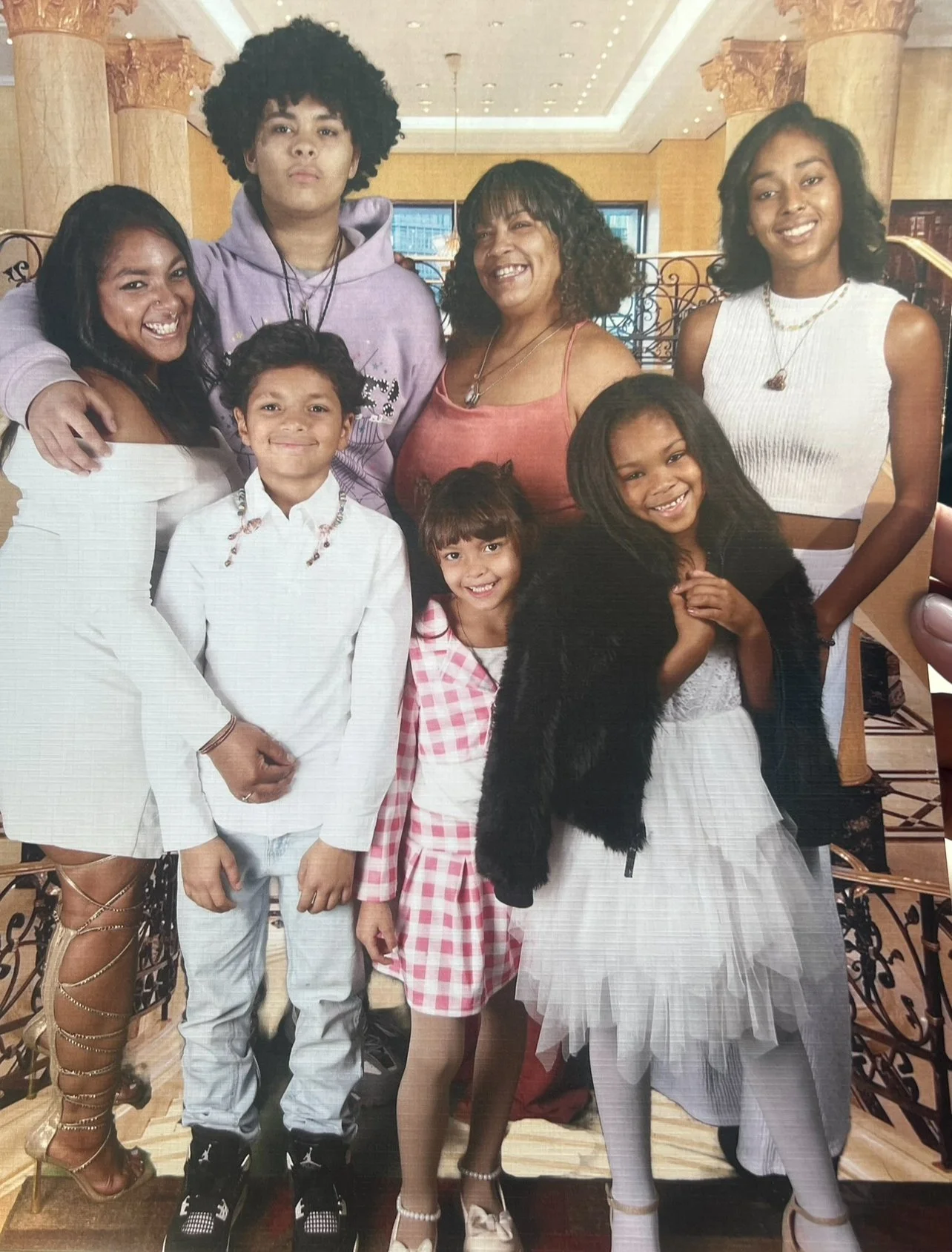 In this picture you will find Selly and Asia both in white they are the CEOs of this business and this is there family!