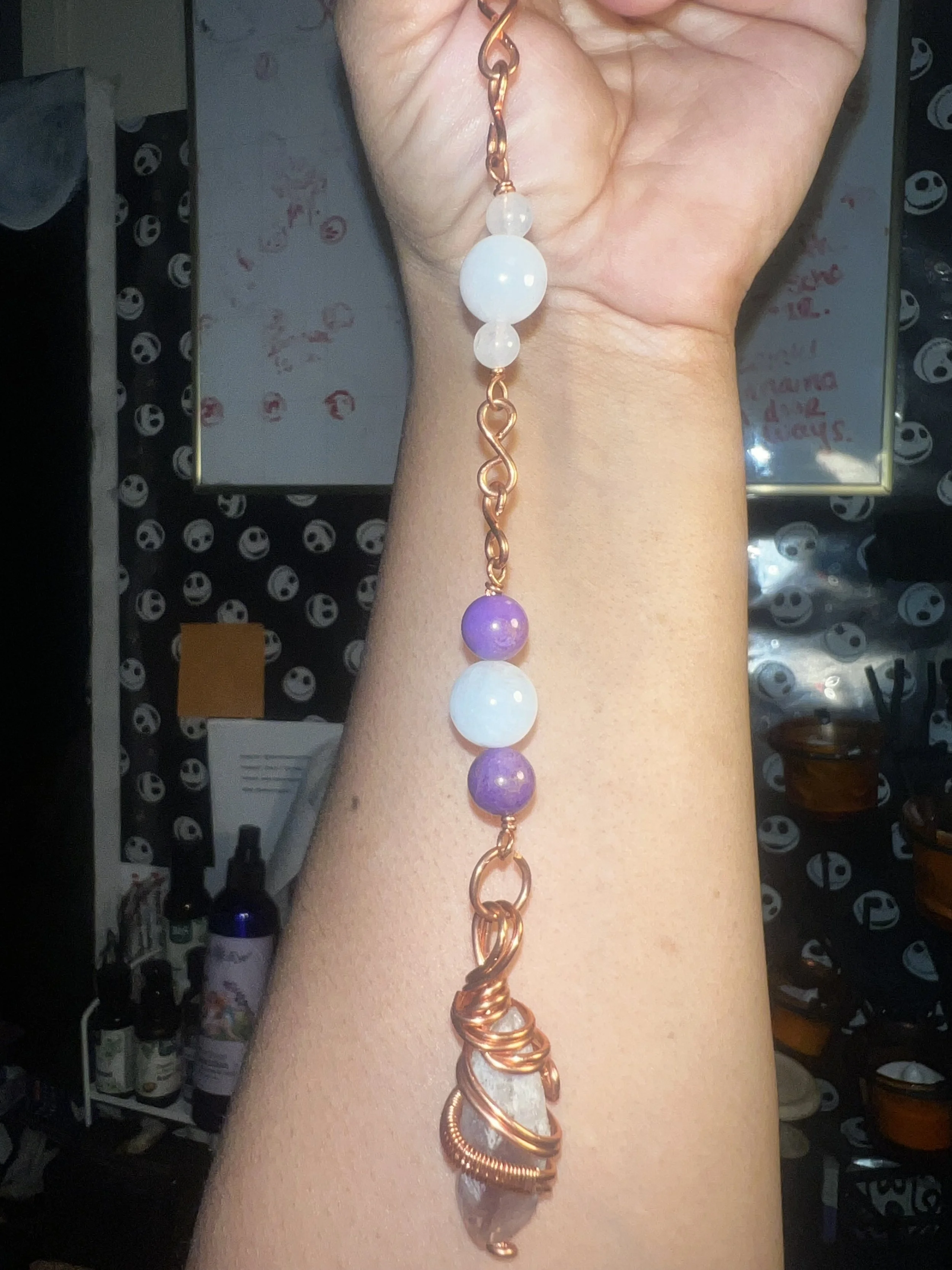 Amethyst wire wrapped shard pendulum.