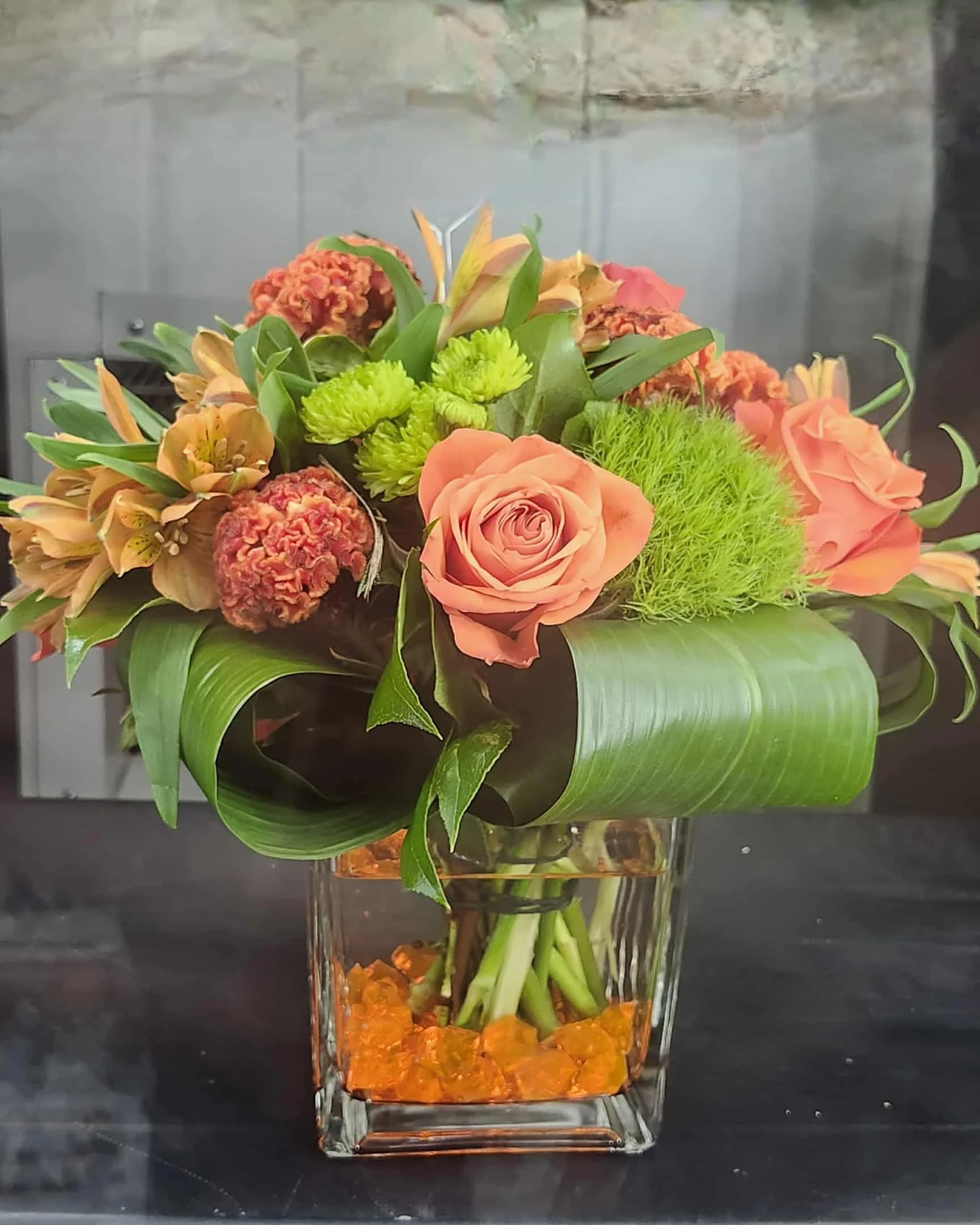 Elegant Citrus Floral Arrangement