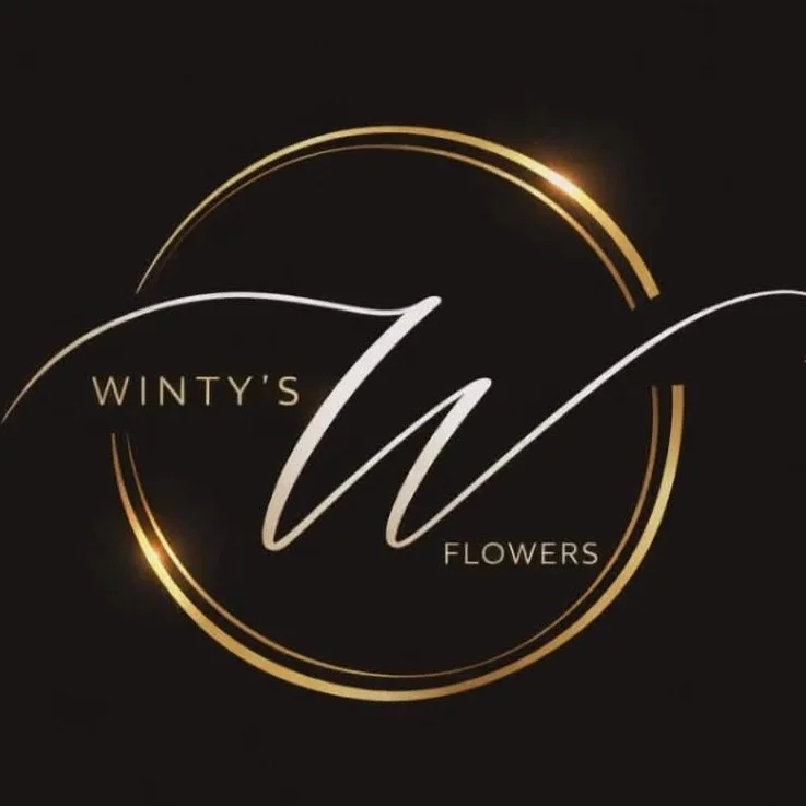 Logo for Winty's Flowers with a stylized letter 'W' surrounded by two gold circular lines on a black background.