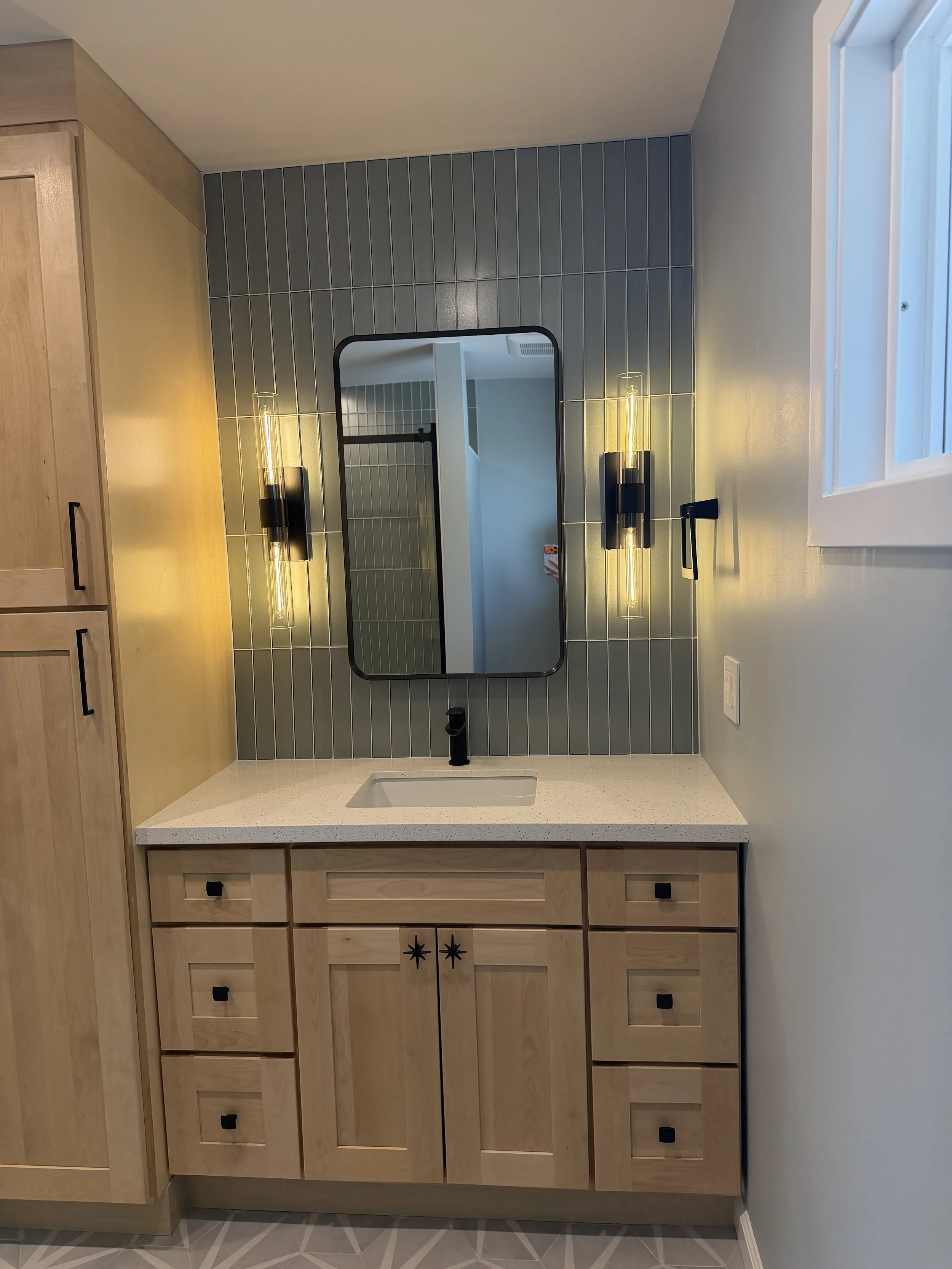 Hall Bathroom Renovation with Glass Tile Backsplash