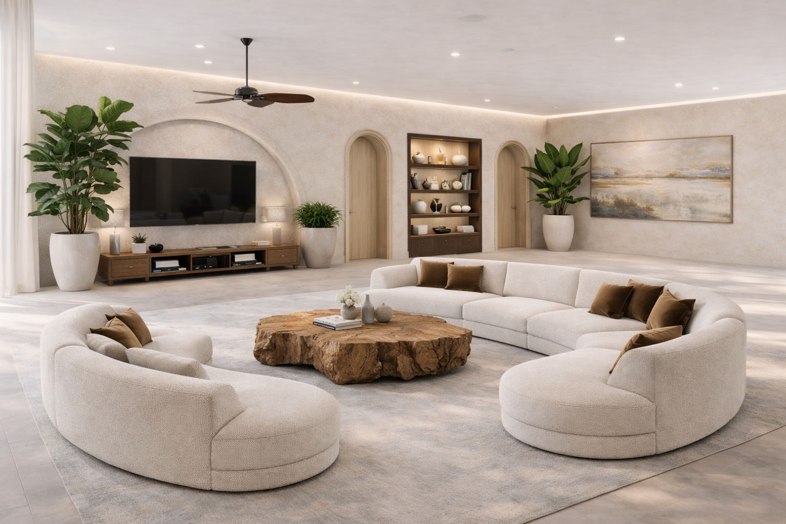 An expansive shared living space with oversized seating and a large smart TV.