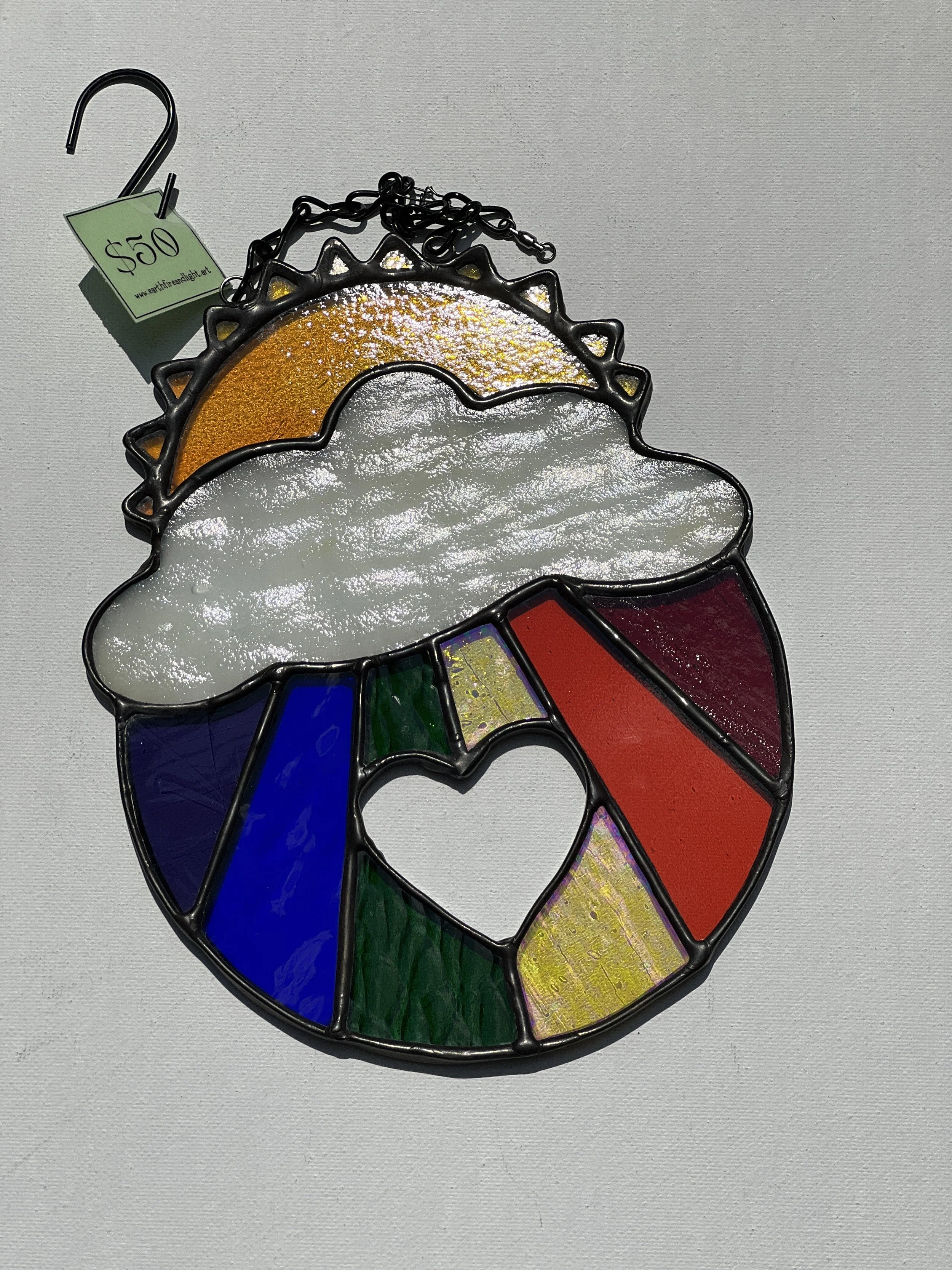 Stained glass rainbow in the clouds