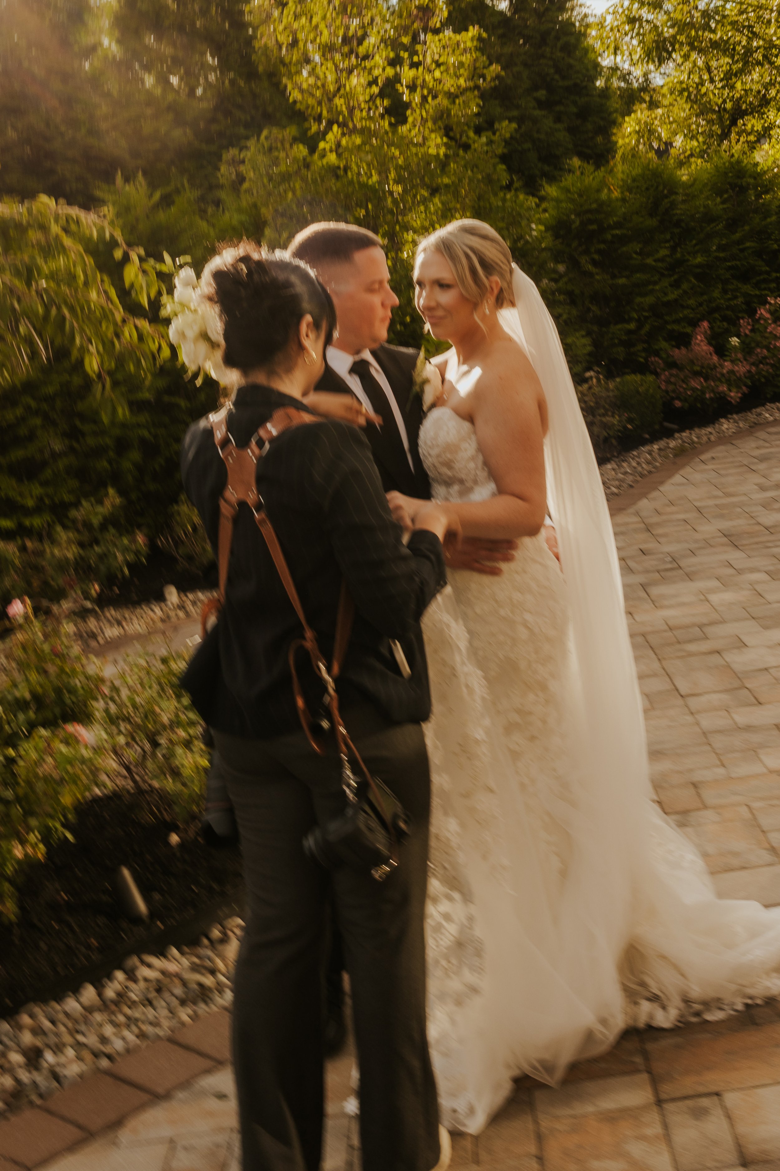 A bride and groom on their wedding day in goshen, NY staged for a photo, with a hudson valley wedding photographer