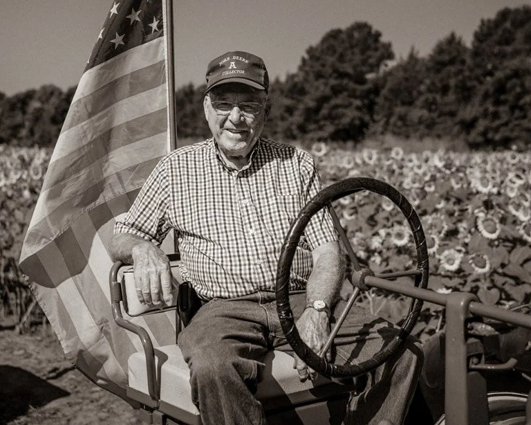 Bobby West led the tractor parade again this year. He has been farming sunflowers and leading the festivities for more than 20 years.