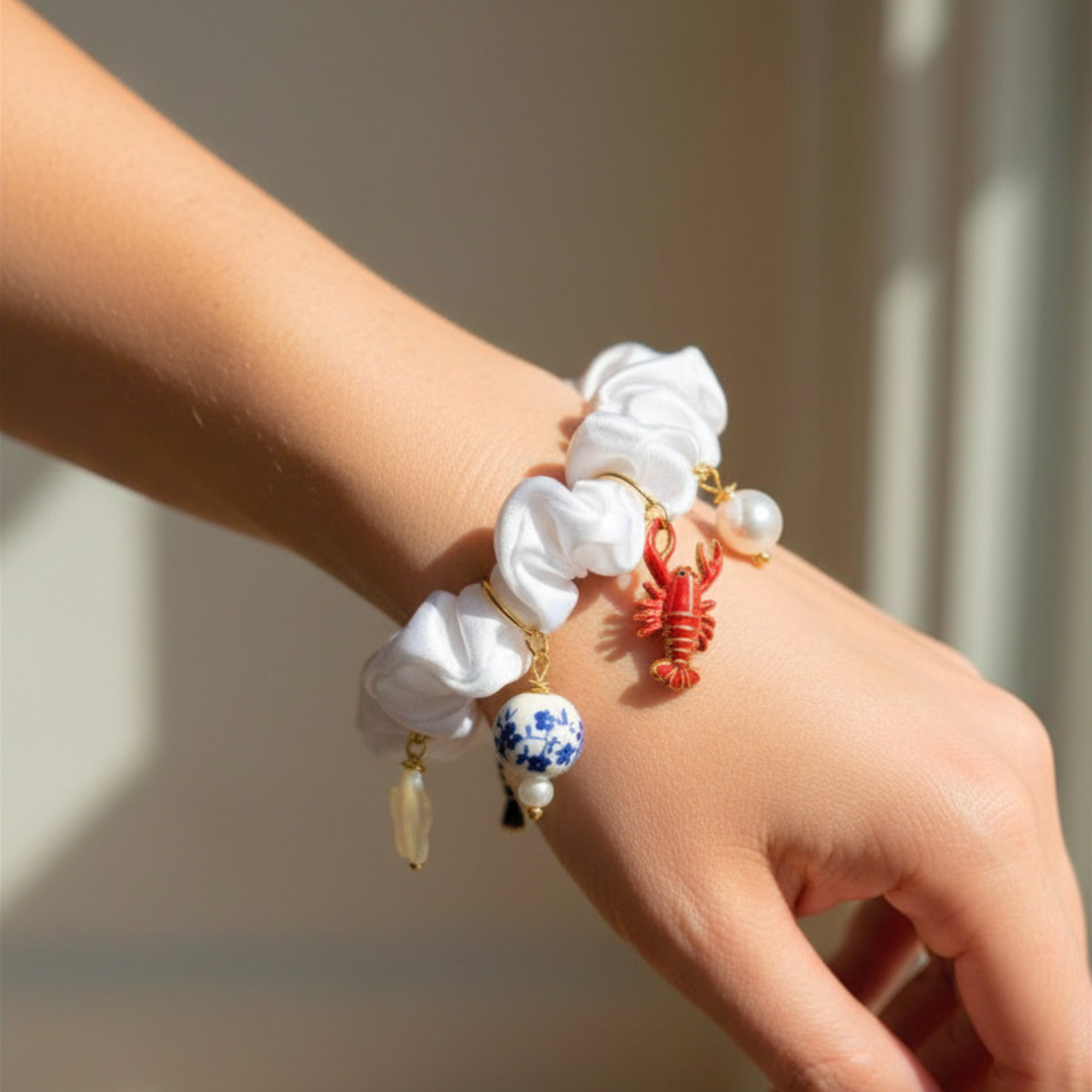 Madaket Charm Scrunchie- white on wrist.png