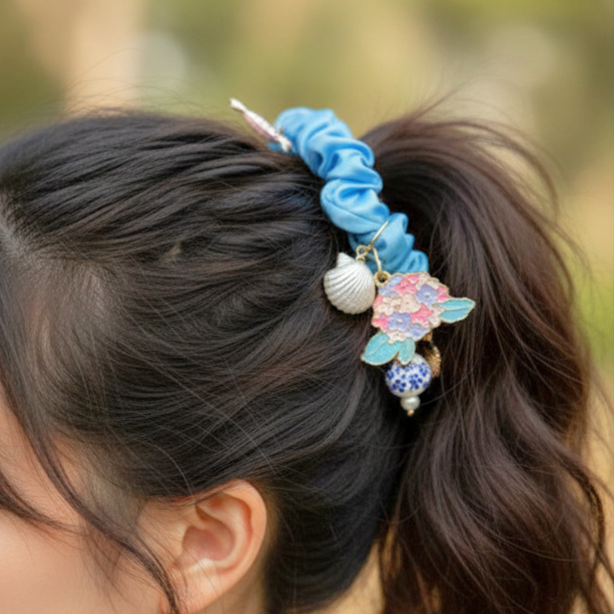 Madaket Charm Scrunchie- lt. blue in hair.png