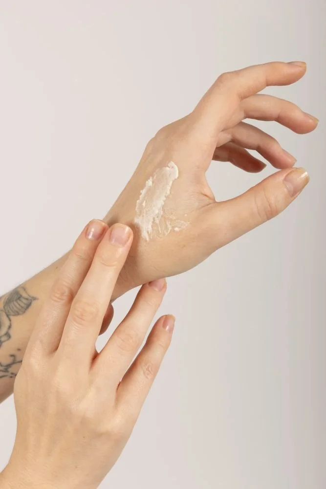 Copy of dewy-skin-healing-tallow-unscented-balm-on-hand.jpg