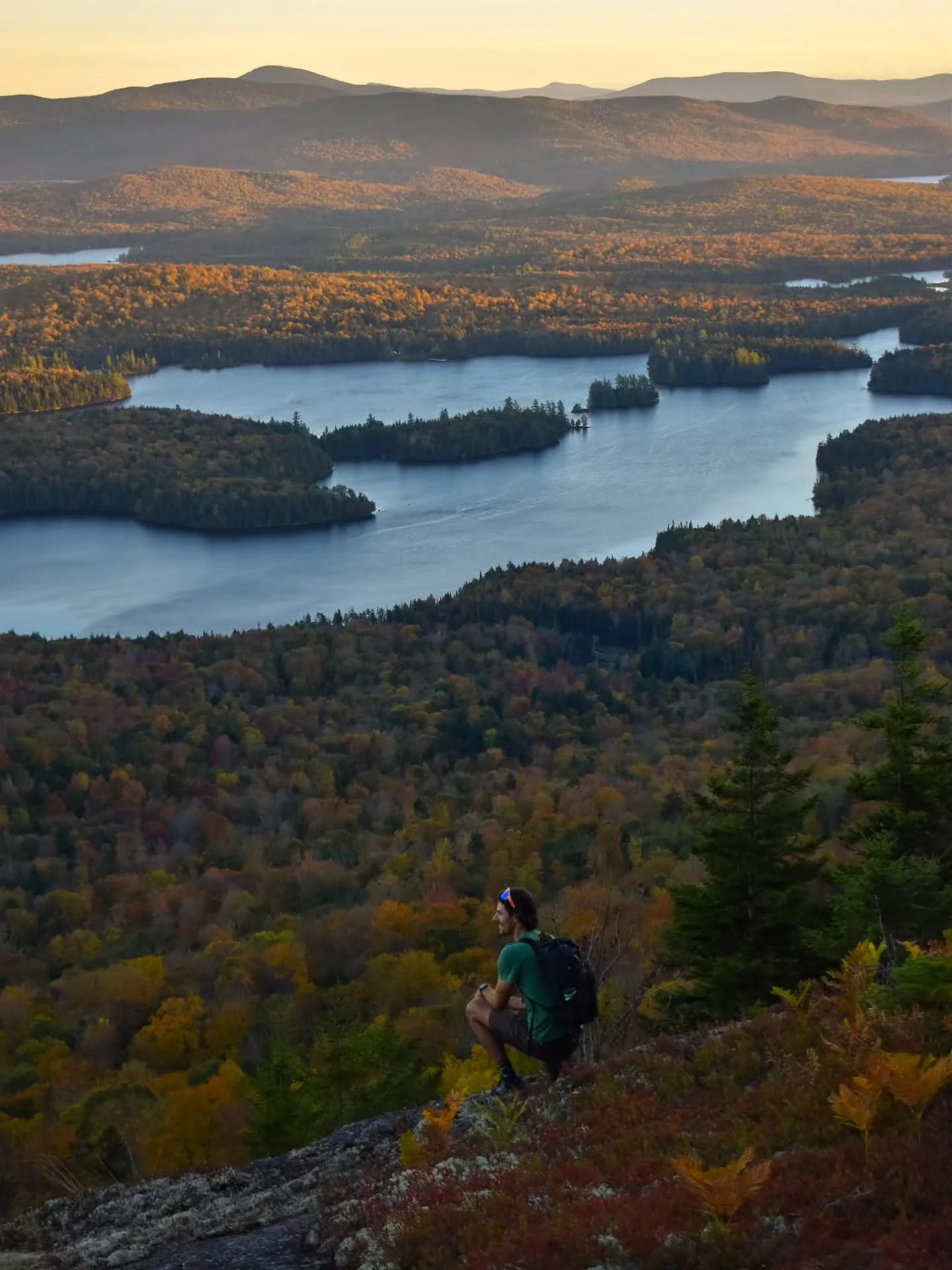 A colorful sunset hike, the northern lights, and a glassy night paddle.
Maybe one of the highest quality fall adventures I've done in recent years. To get to this unique view stretching from the southern High Peaks to Lake Eaton, we crossed a couple