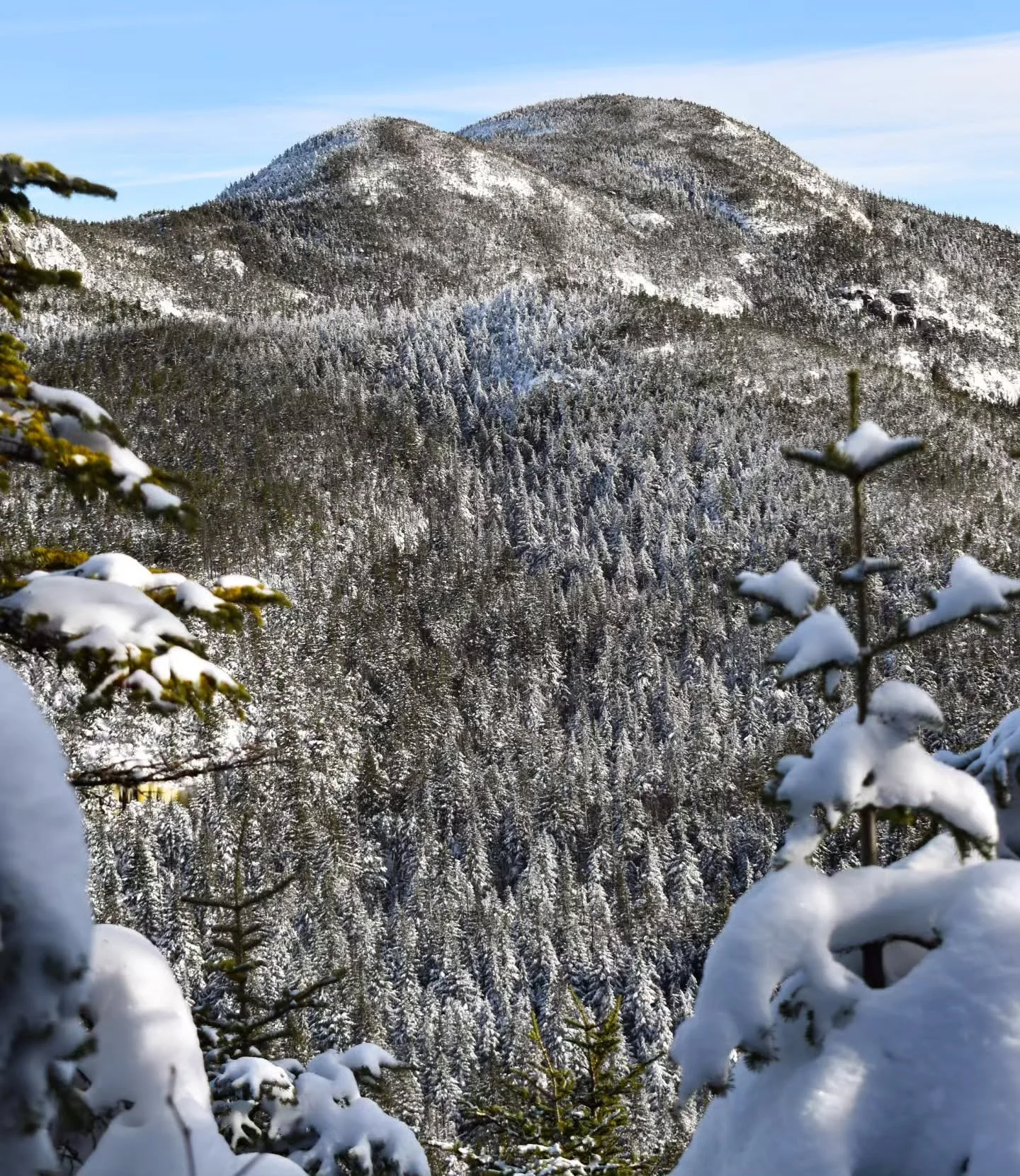A High Peaks winter homecoming.

Wow, it's been a couple of years since I've found myself on a High Peak in the winter, and what better excuse to go back than my Dad working on that W!

I think one of the things I missed most was the community of fol