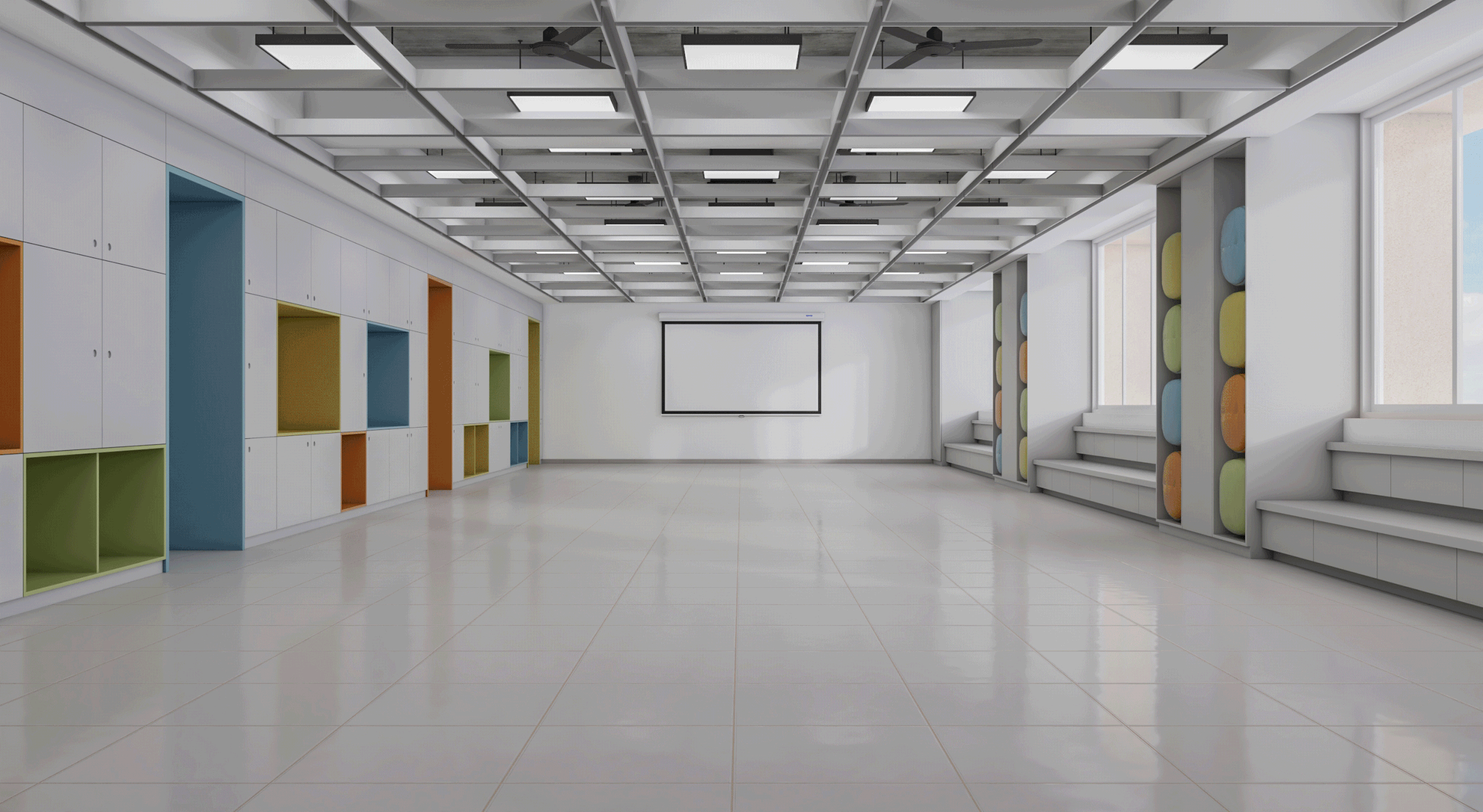 A modern, brightly lit classroom with colorful built-in shelves along the walls, a white projector screen at the front, large windows allowing natural light, and a tiled floor.