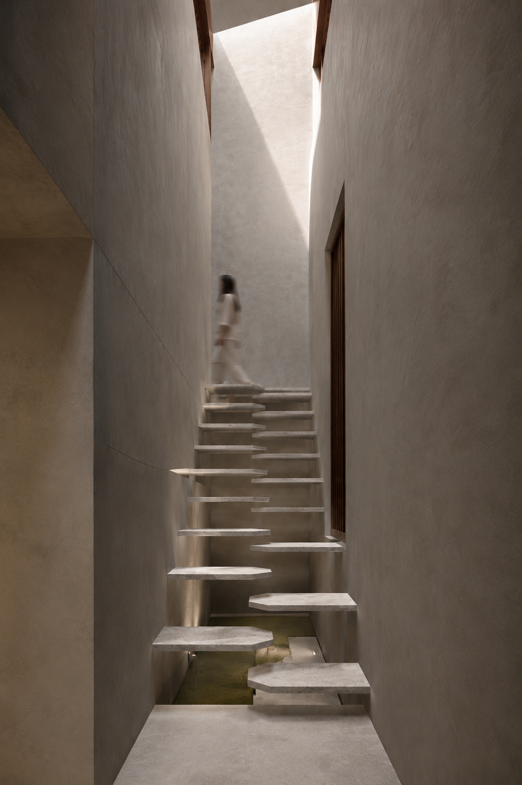 A narrow, minimalist interior space with floating marble stairs leading up to a bright, skylight-lit area, with a blurred woman walking on the stairs.