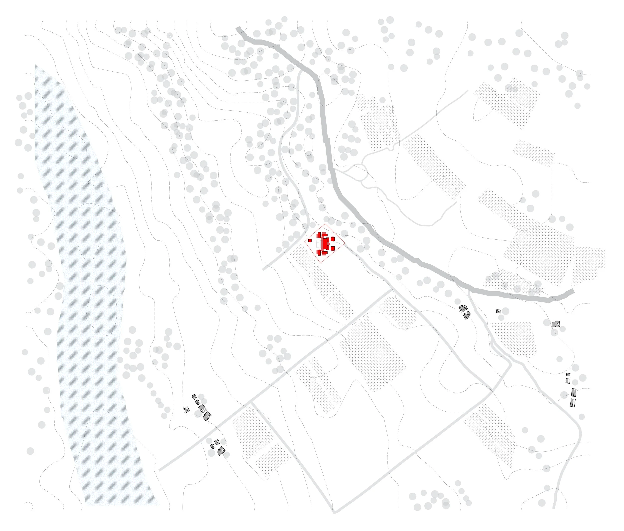A topographical map showing various land features, roads, a river, and a cluster of red buildings.