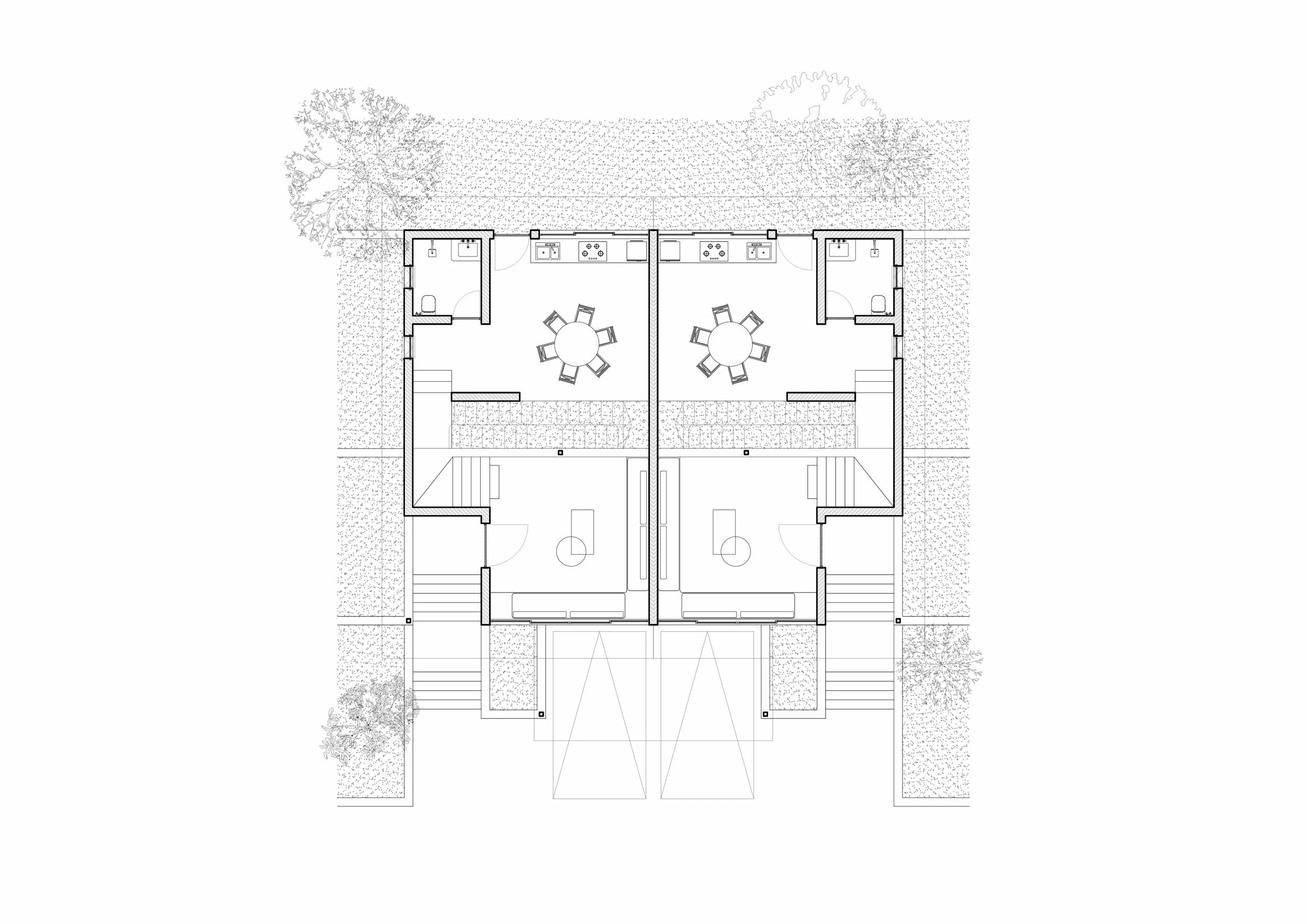 Architectural floor plan of a building including rooms, stairs, kitchen area, living spaces, and surrounding landscape with trees.