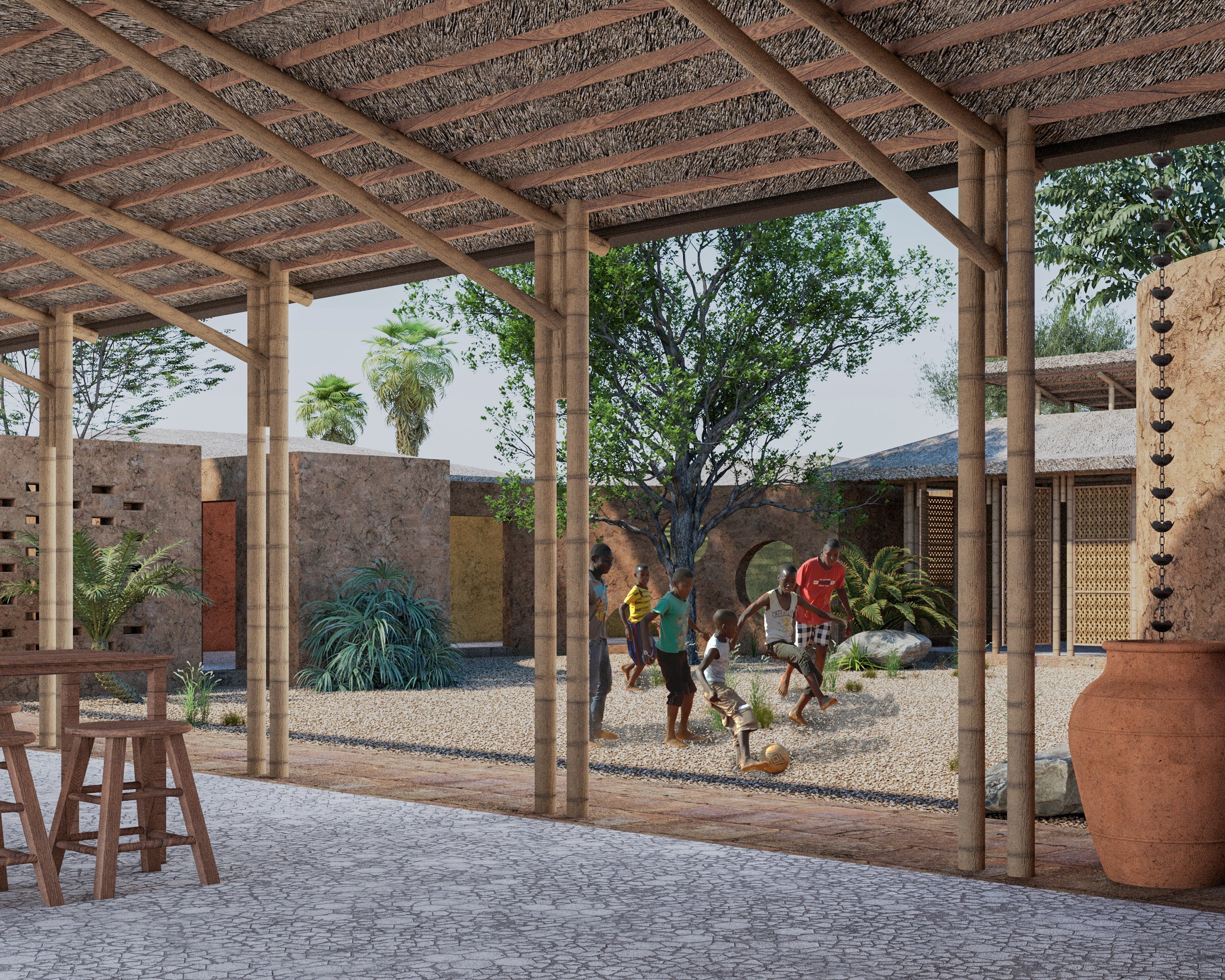 A group of children playing soccer outside under a wooden canopy with a thatched roof, surrounded by plants and trees, in a sunny environment.