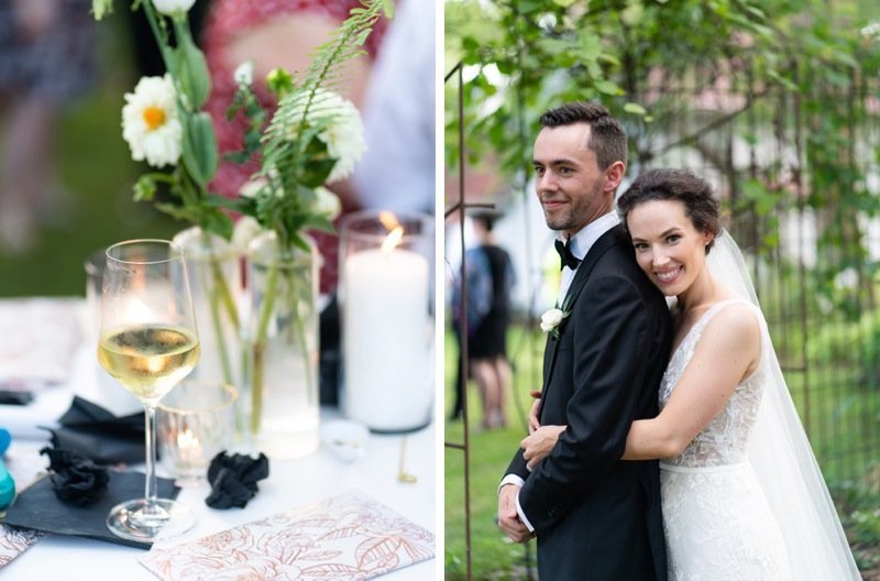 A wedding reception table with flowers, candles, and a glass of white wine, alongside a happy bride and groom embracing outdoors.