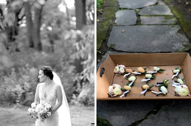 Black and white photo of a bride holding a bouquet outdoors on a stone pathway.