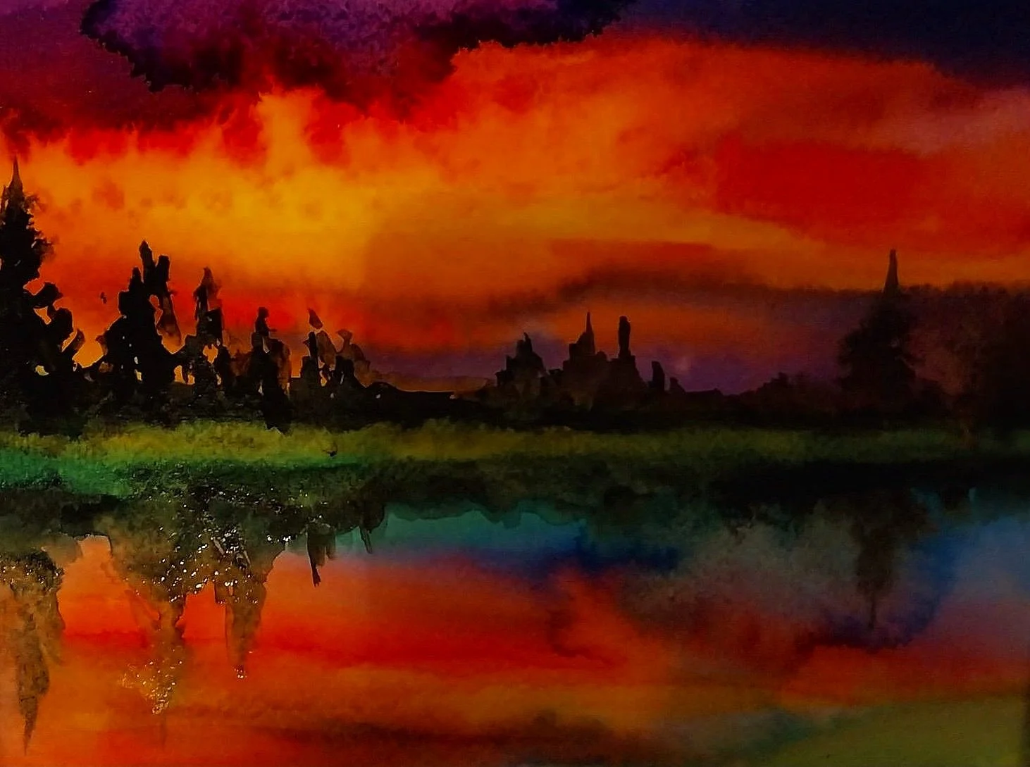 Watercolor painting of a sunset over a lake with silhouetted trees and reflections in the water.