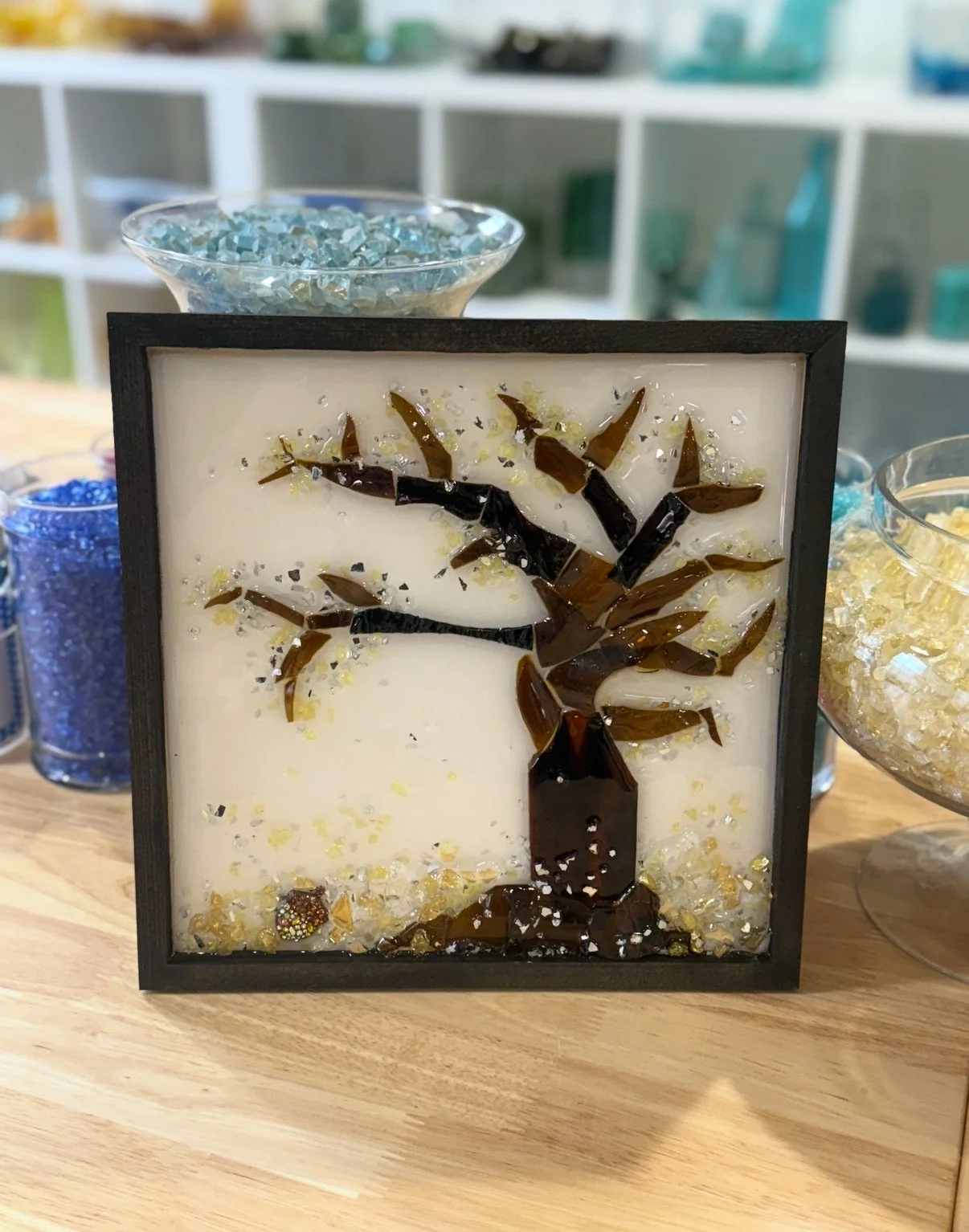 Resin Glass Art of a winter tree using cut and crushed glass in a painted frame.