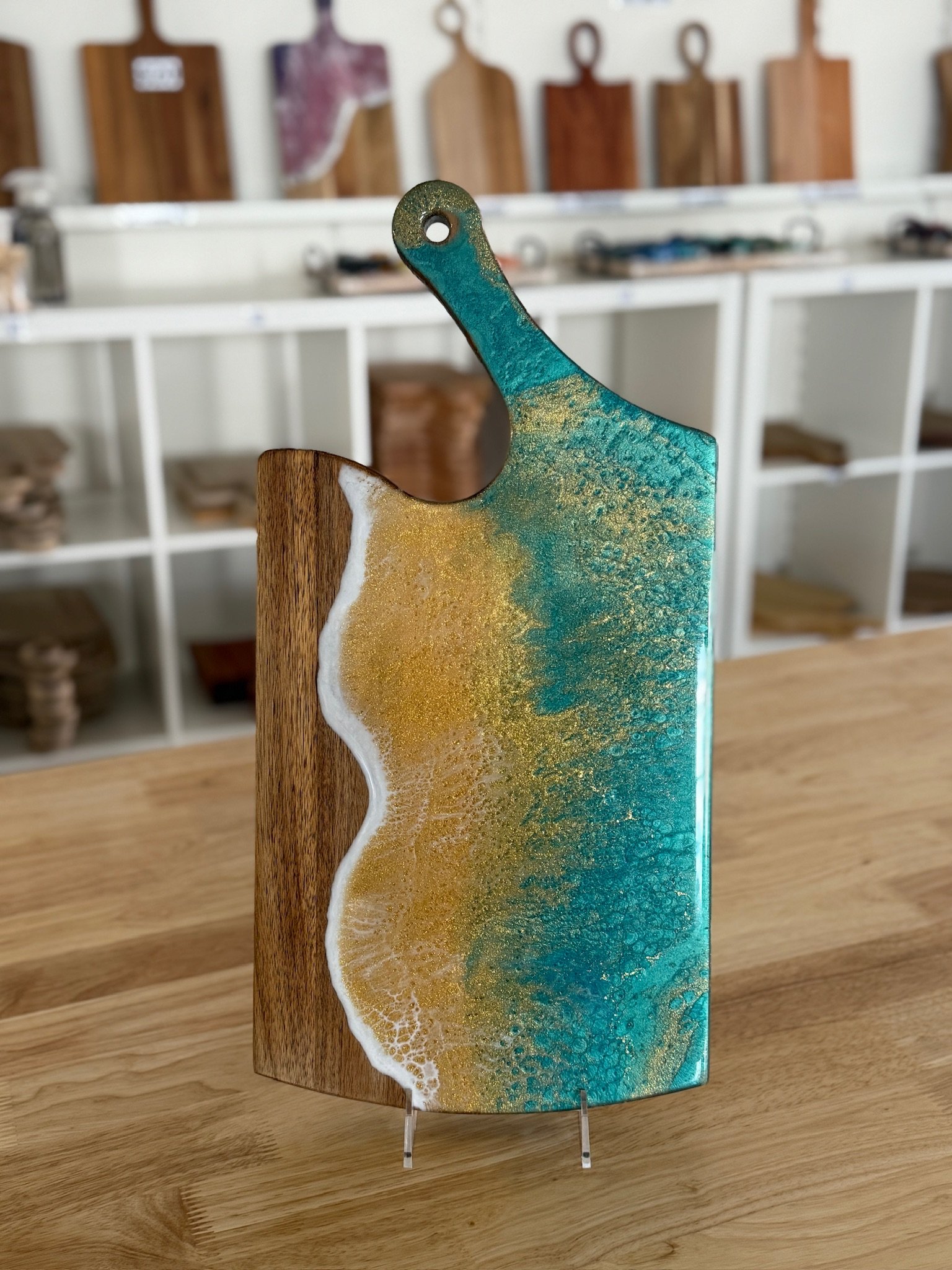 Green and gold ocean wave wood resin charcuterie board