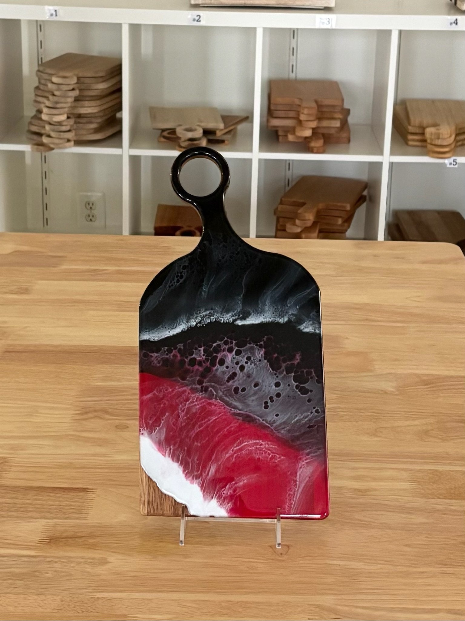 Black, red, and white wave wood resin charcuterie board