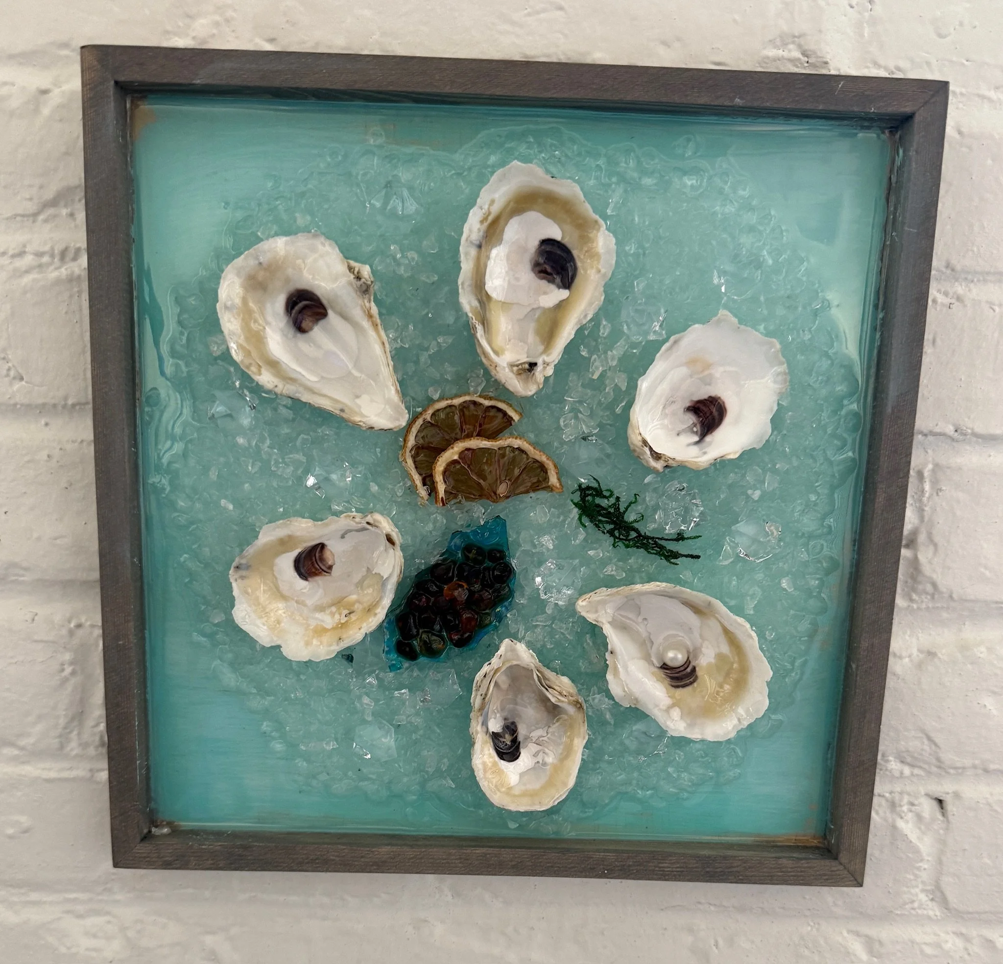 Oyster on ice with lemon and caviar Cut/Crushed Glass Resin Art