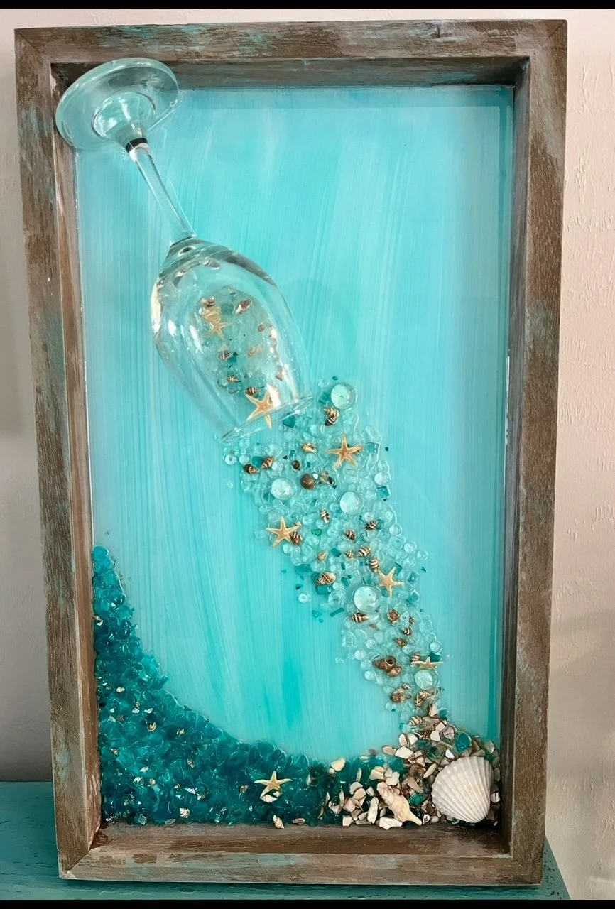 Wine pouring out of glass onto beach Cut/Crushed Glass Resin Art