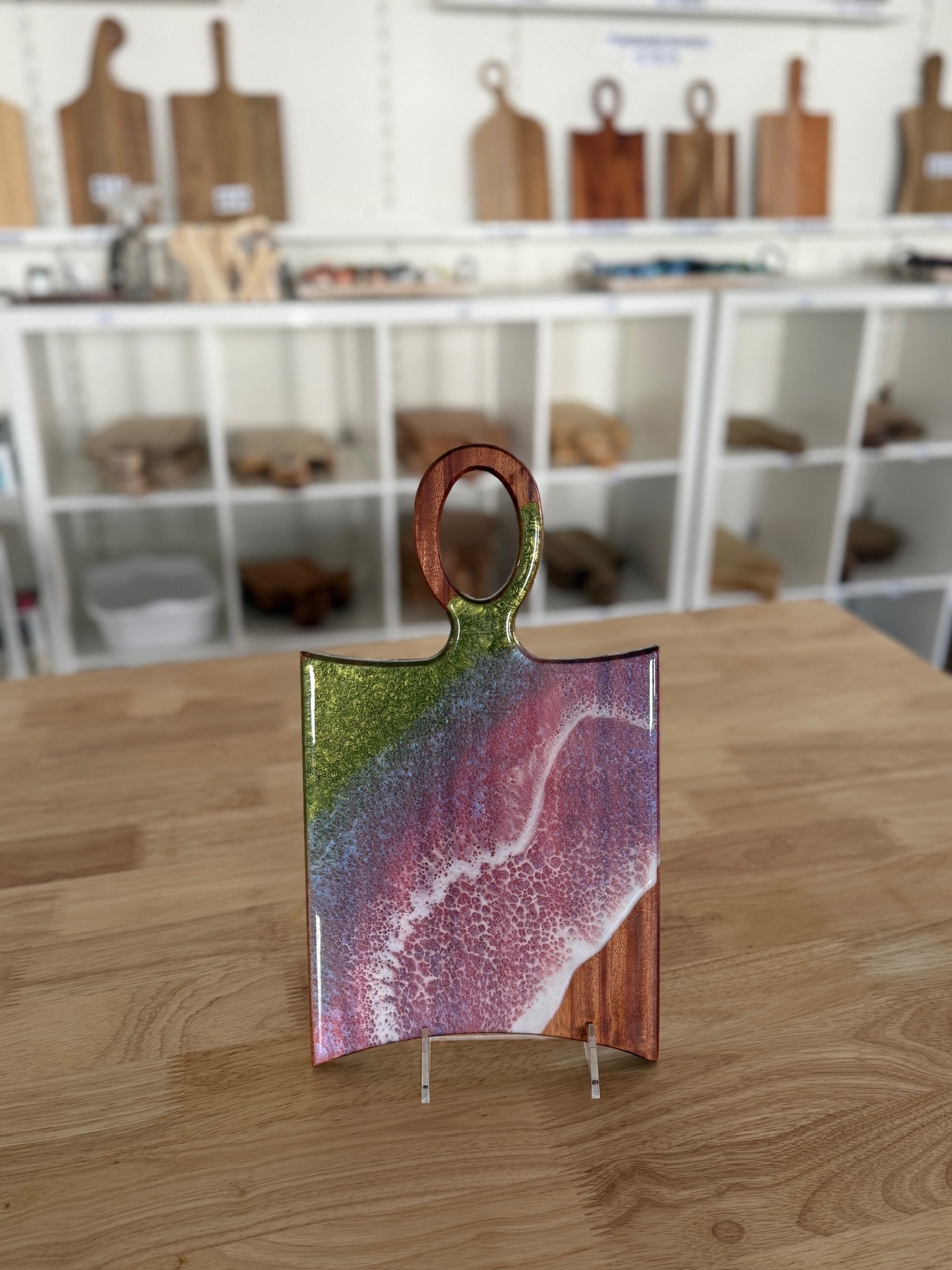 Pink, silver, and white wave wood resin charcuterie board